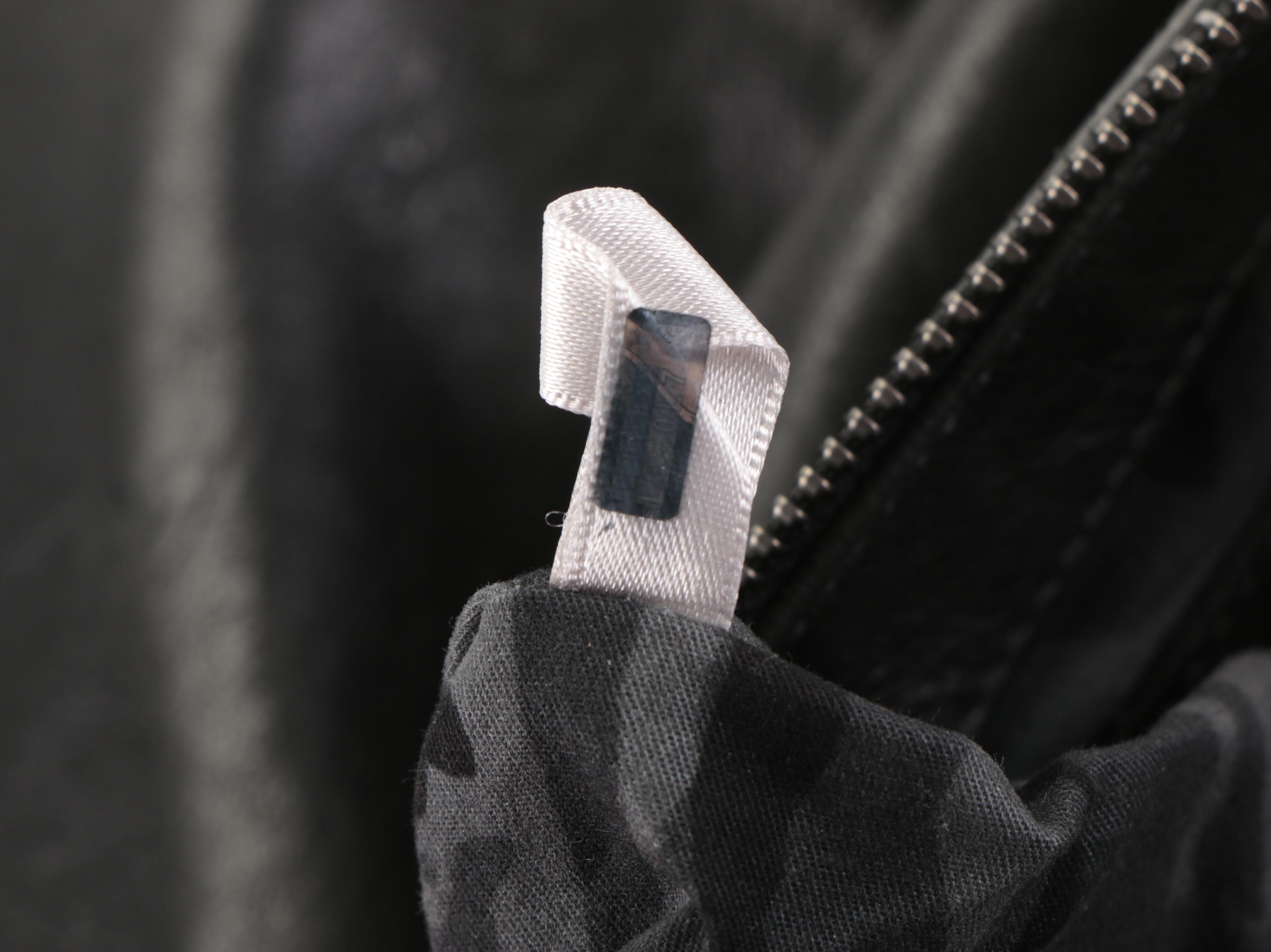 Jimmy Choo Star Studded Oversized Clutch in Black Leather