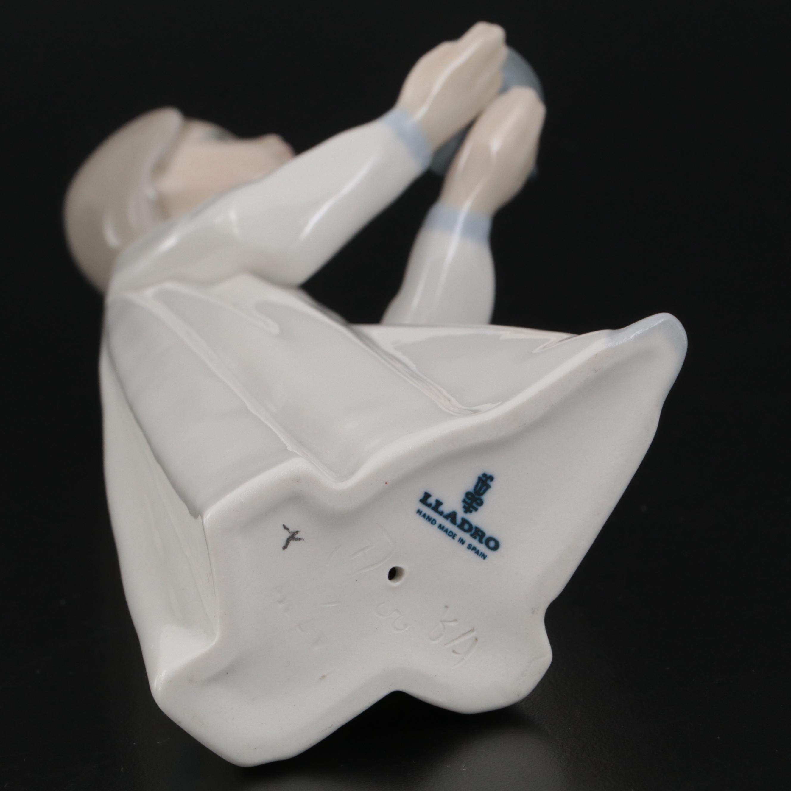 Lladró "Girl with Candle" by Fulgencio Garcia and Other Lladró Figurines