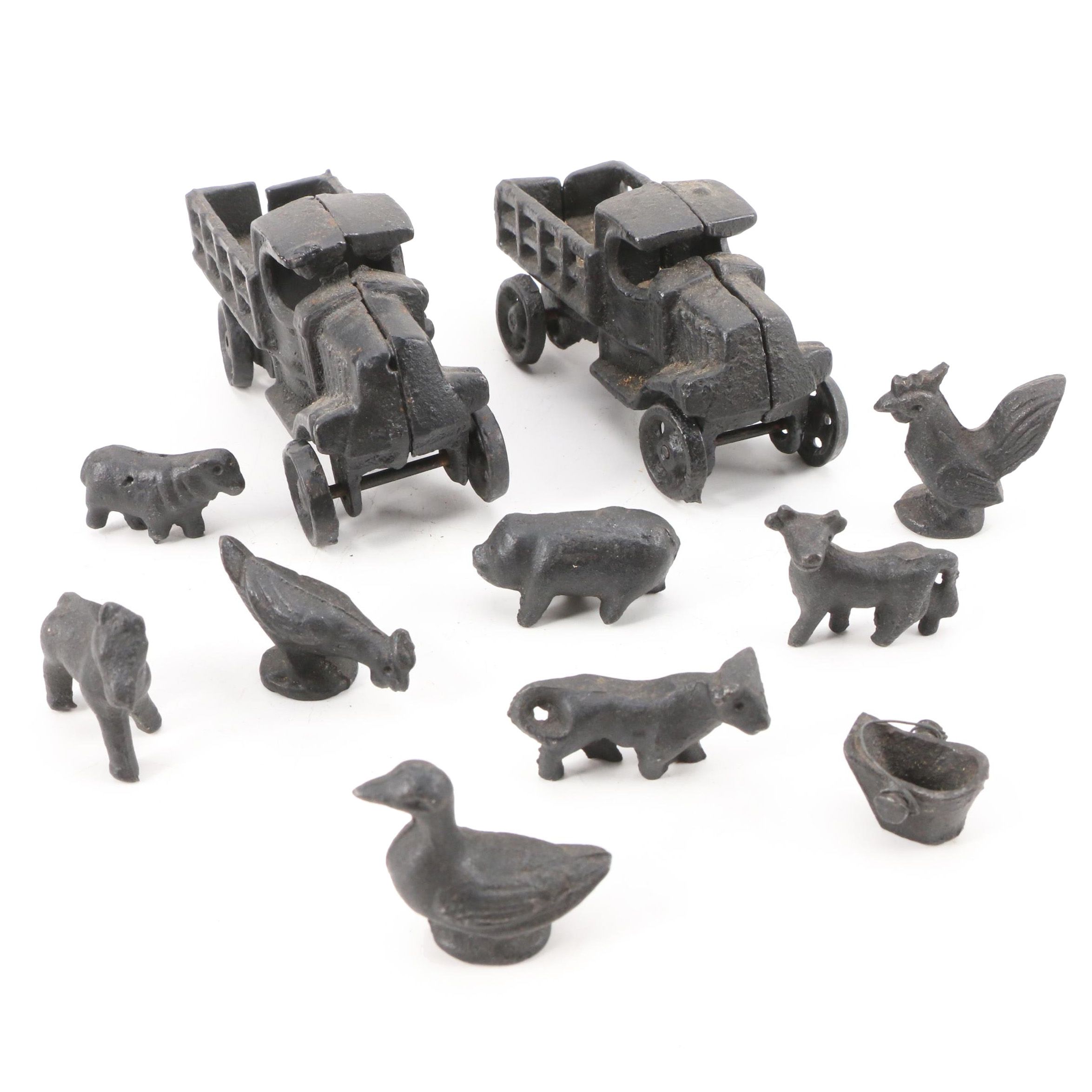 Cast Iron Toy Trucks with Cast Iron Farm Animal Figurines, Mid to Late 20th C.