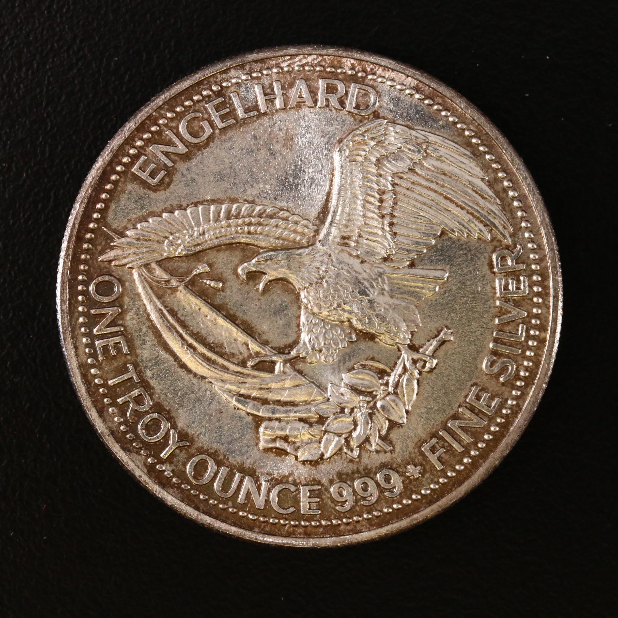 Group of World Coins, World Coin Replicas, and Engelhard 1 oz. Silver Round