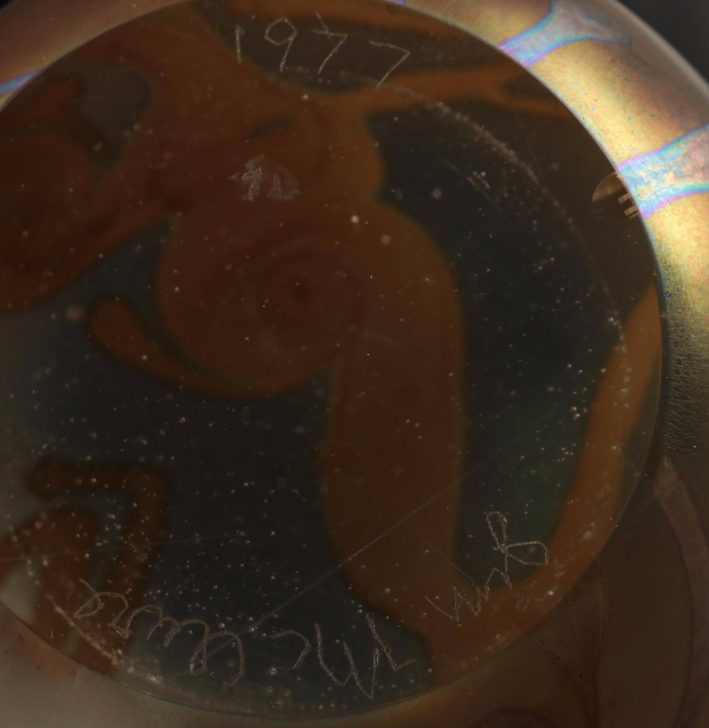 Jim McClure Iridescent Glass Paperweight with Other Glass and Stone Paperweights