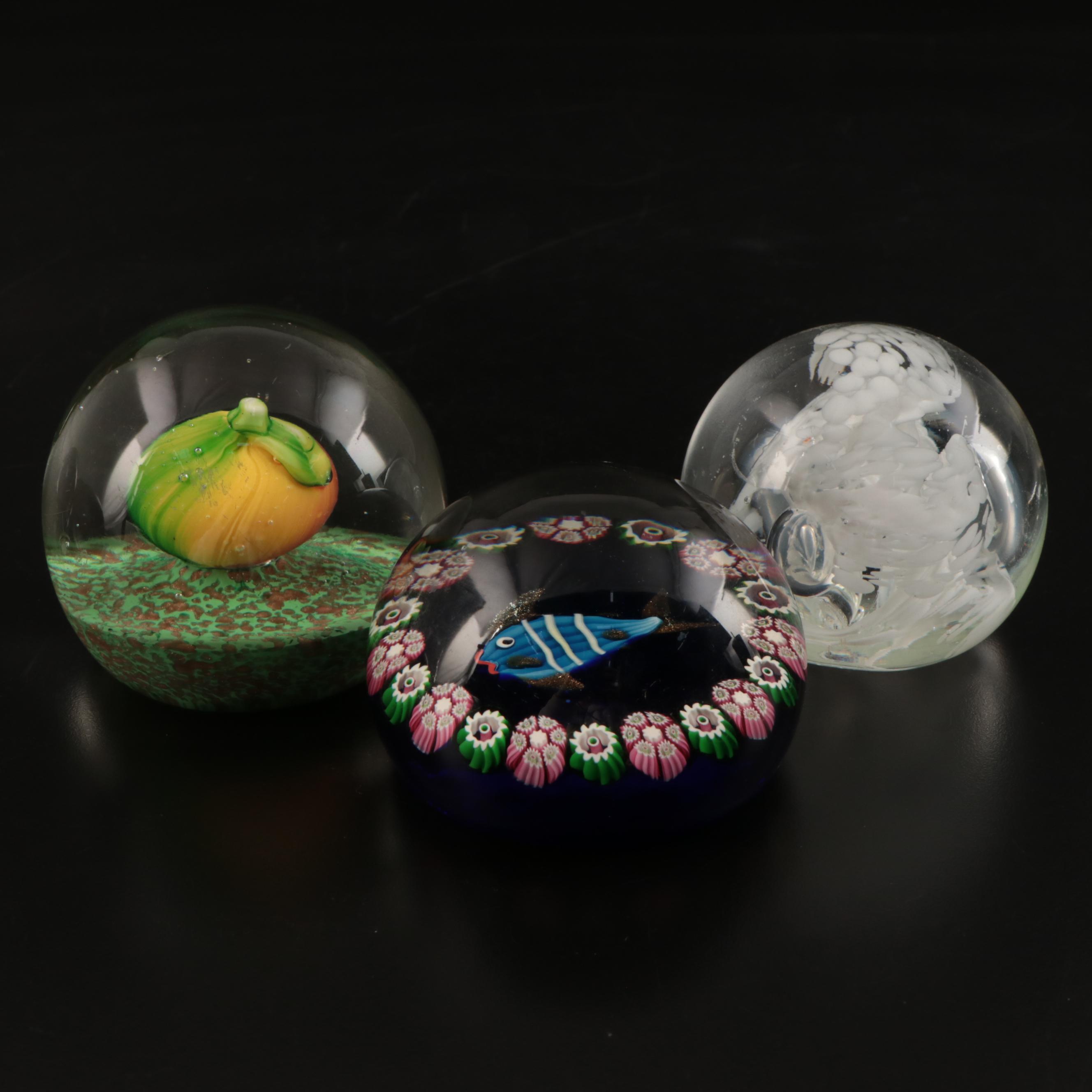 Jim McClure Iridescent Glass Paperweight with Other Glass and Stone Paperweights