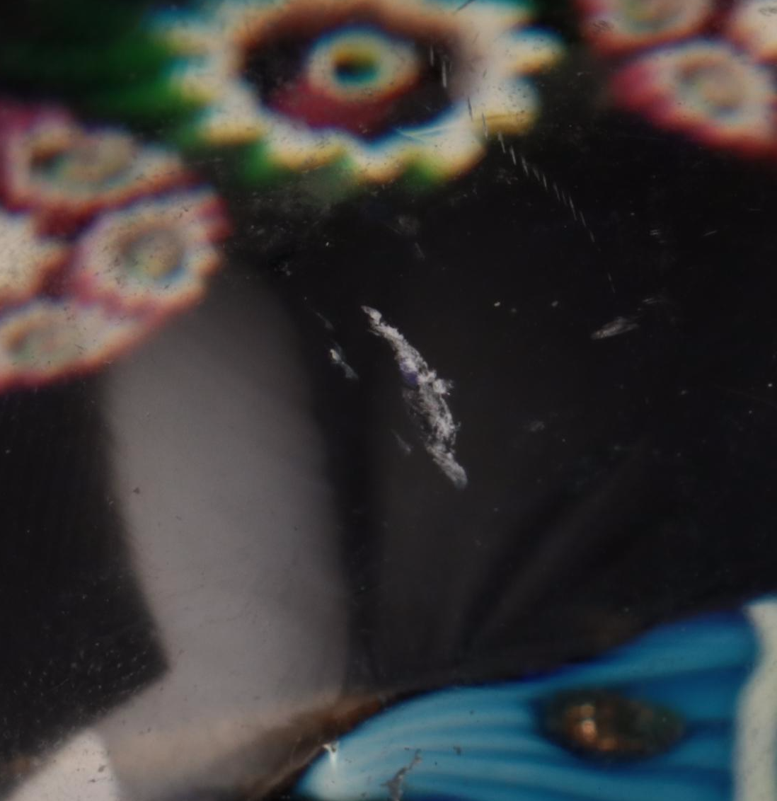 Jim McClure Iridescent Glass Paperweight with Other Glass and Stone Paperweights