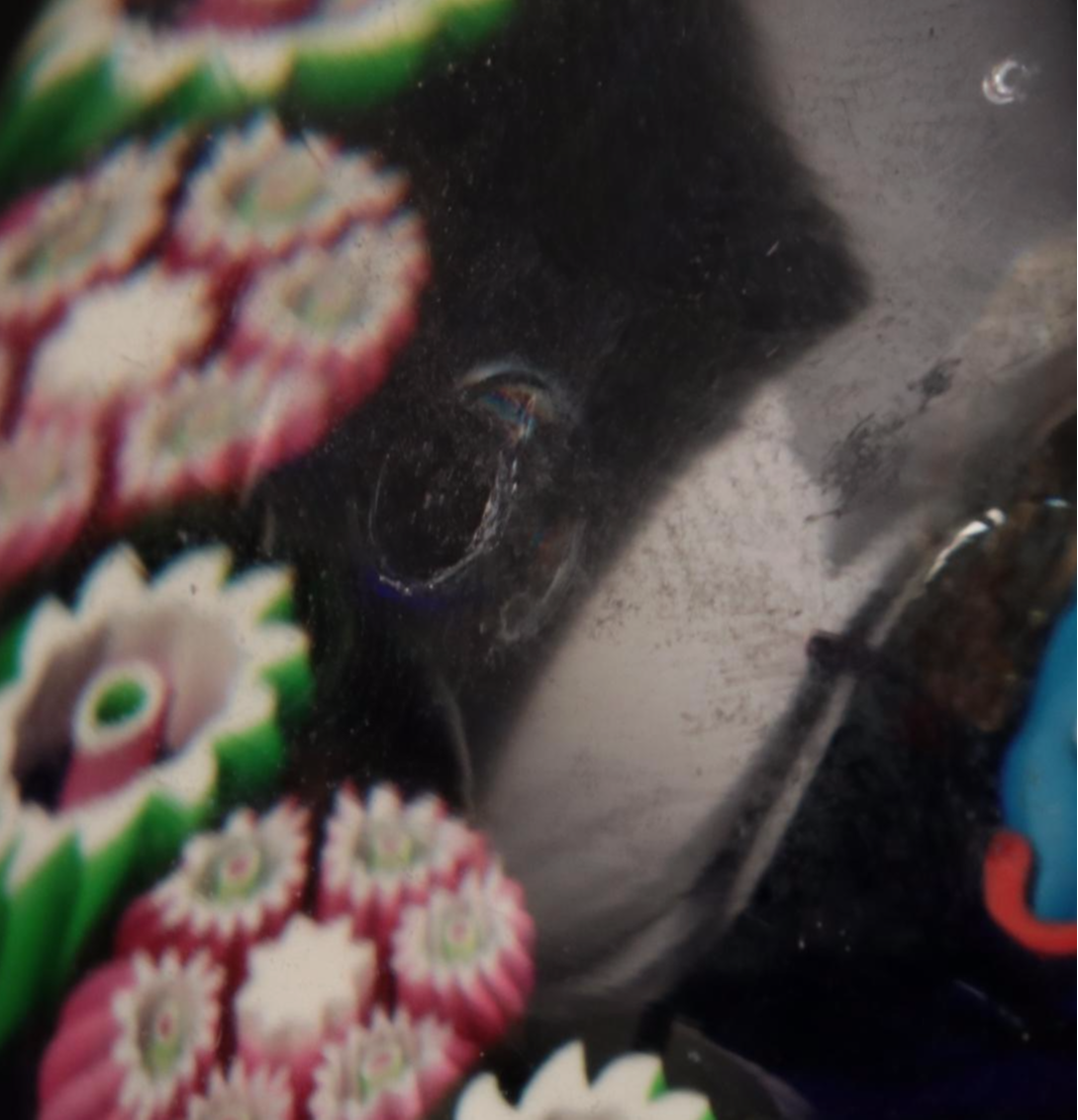 Jim McClure Iridescent Glass Paperweight with Other Glass and Stone Paperweights