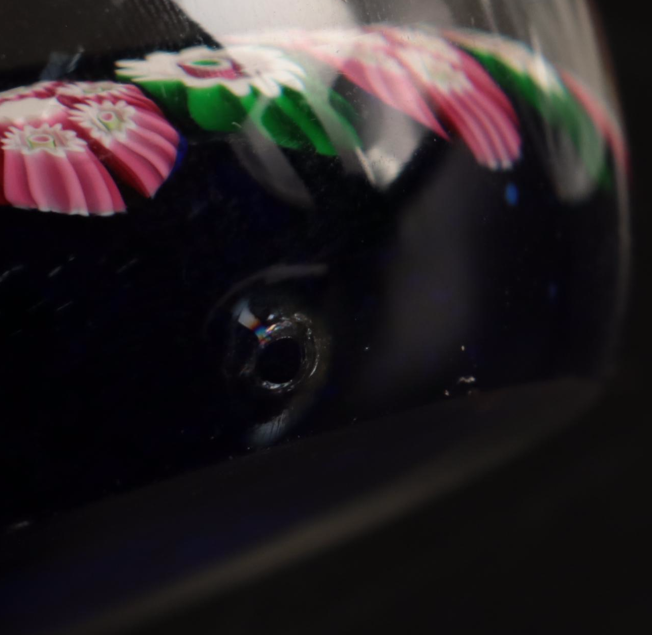 Jim McClure Iridescent Glass Paperweight with Other Glass and Stone Paperweights