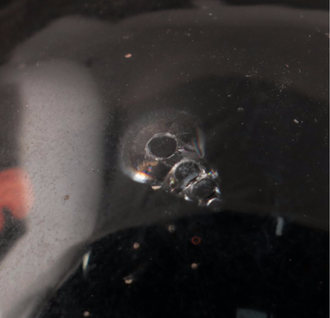 Jim McClure Iridescent Glass Paperweight with Other Glass and Stone Paperweights