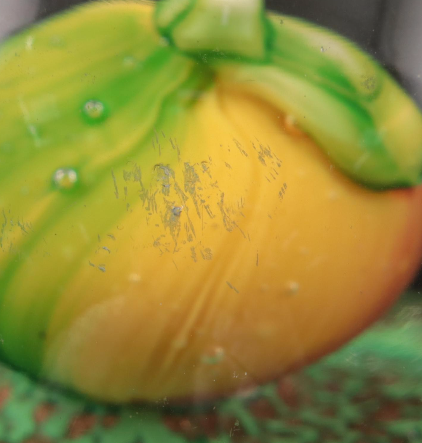 Jim McClure Iridescent Glass Paperweight with Other Glass and Stone Paperweights