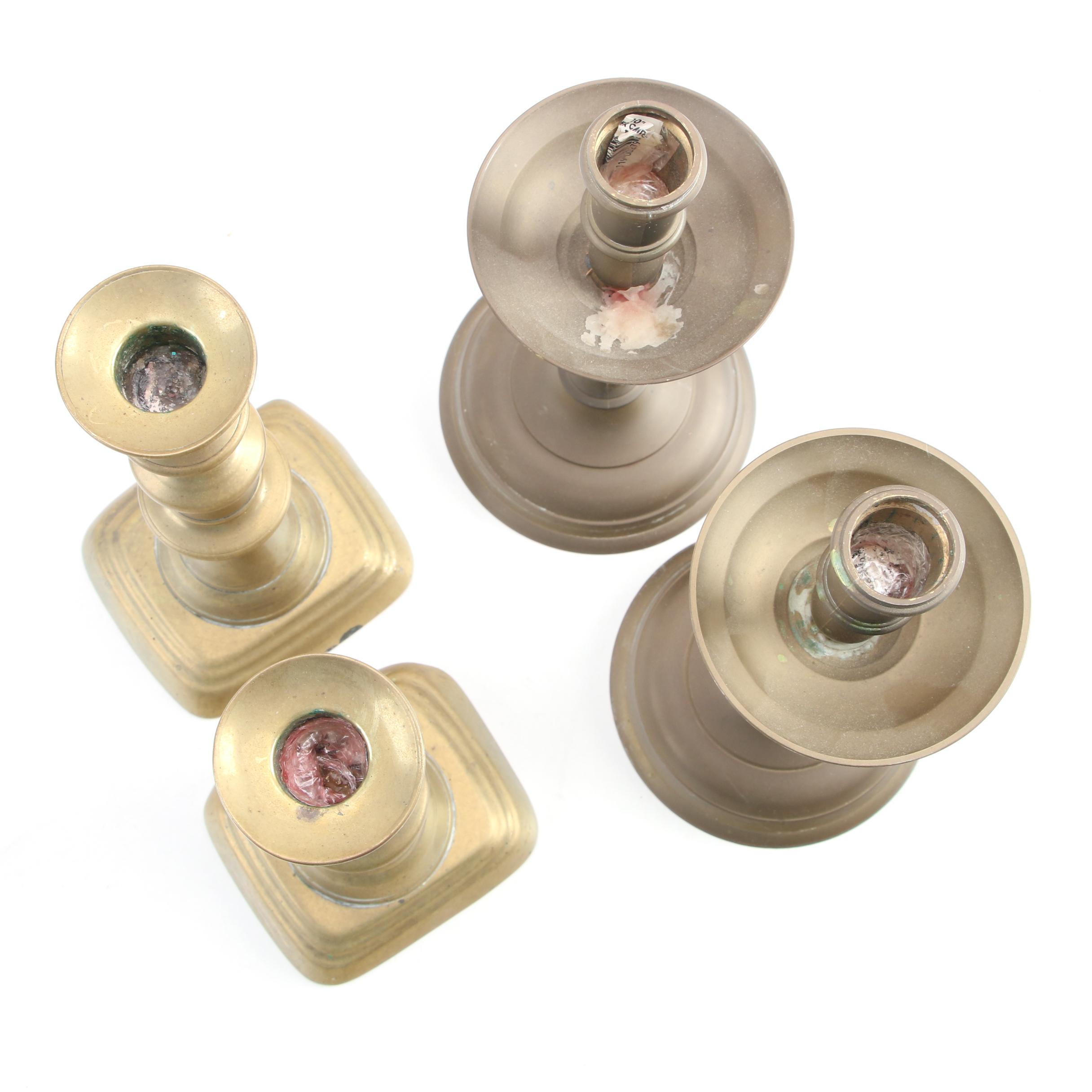 English Push-Up and Other Brass Candlesticks