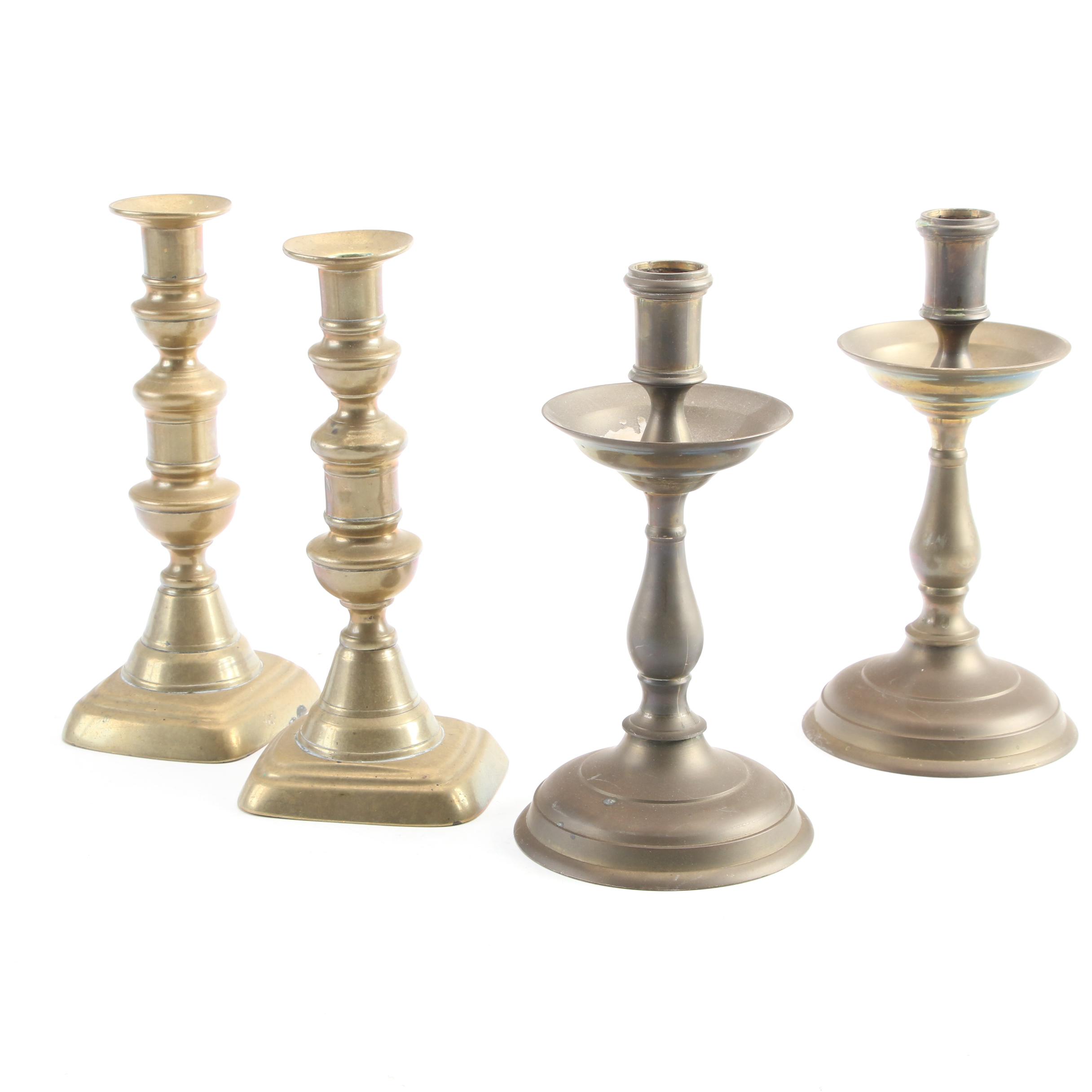 English Push-Up and Other Brass Candlesticks