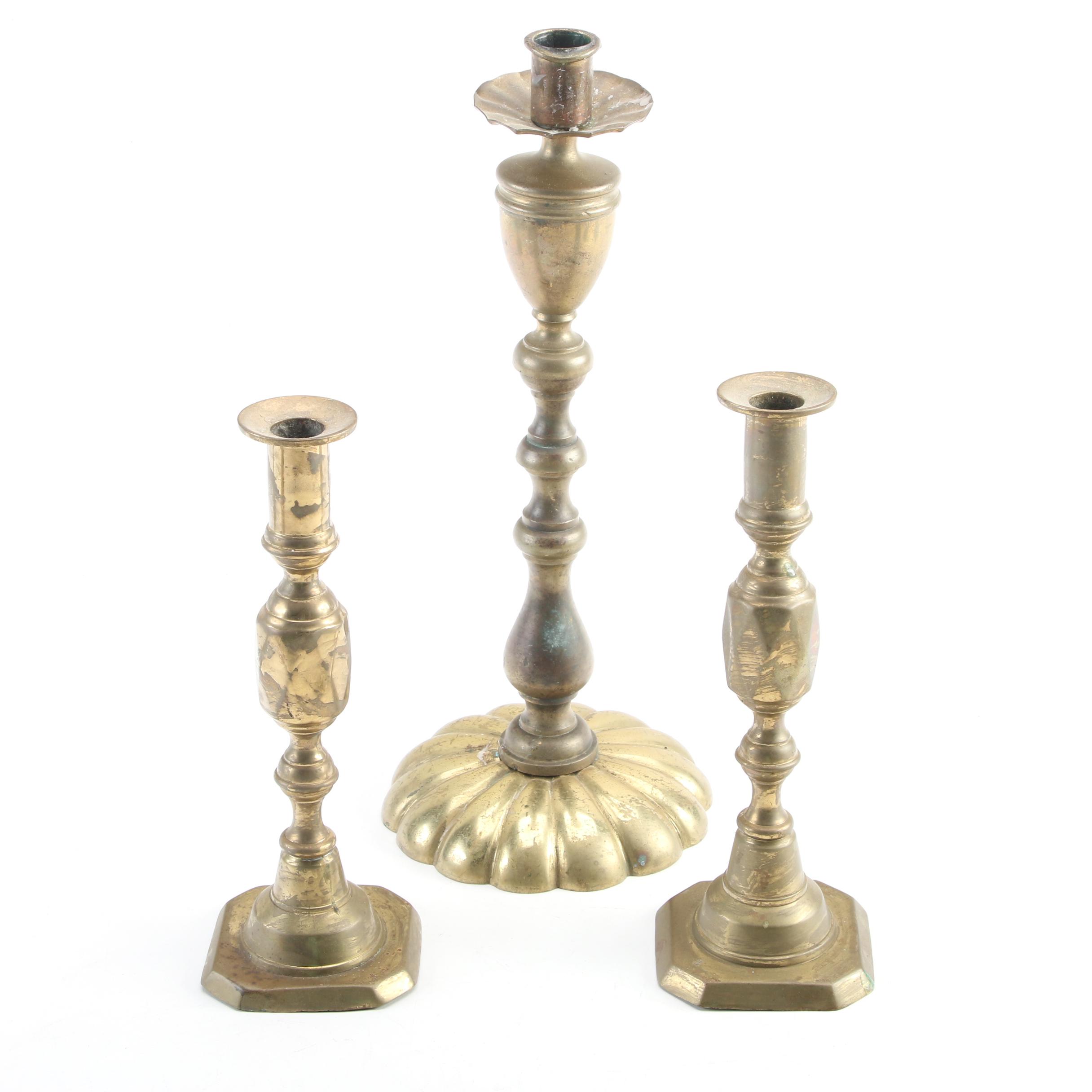 English Push-Up and Other Brass Candlesticks
