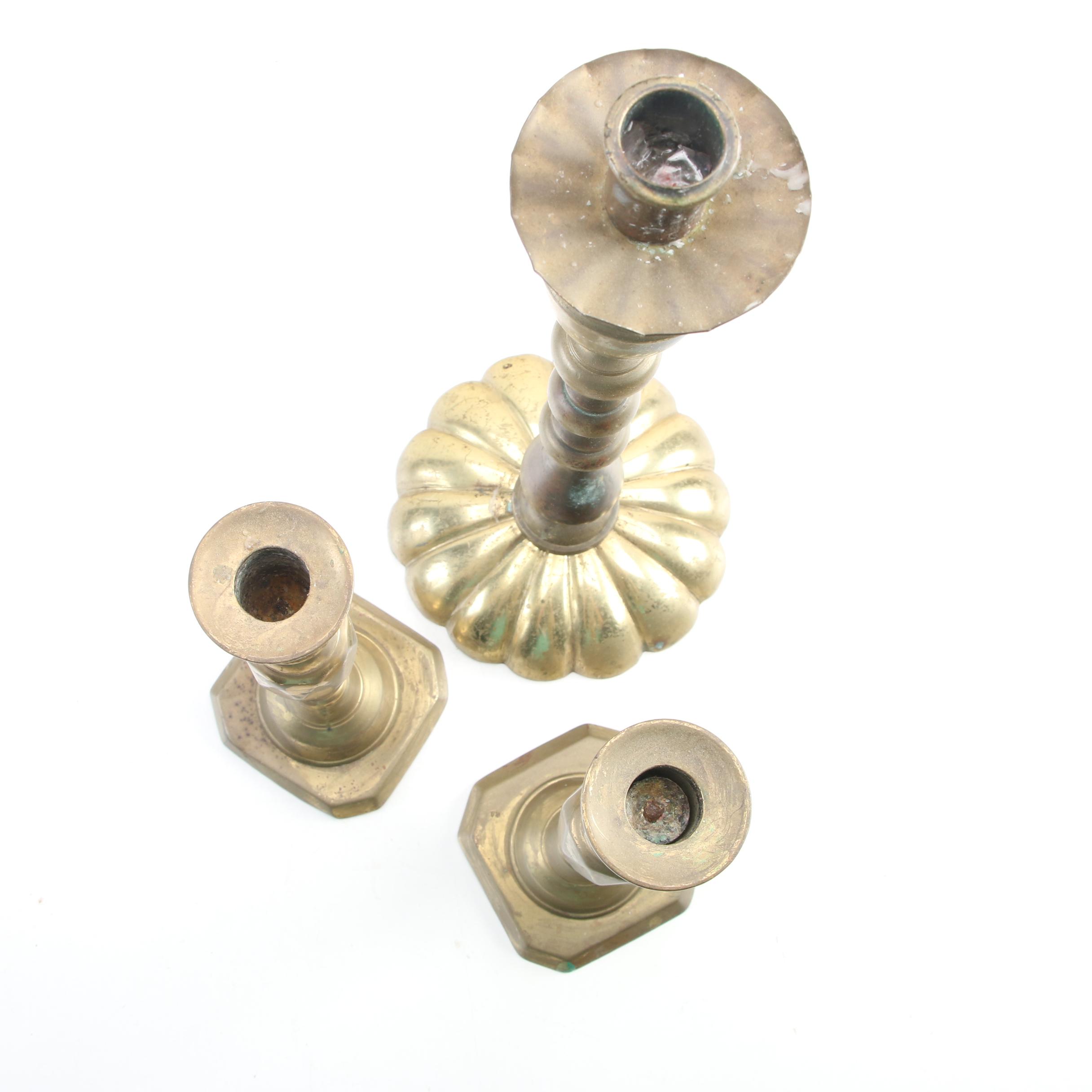 English Push-Up and Other Brass Candlesticks