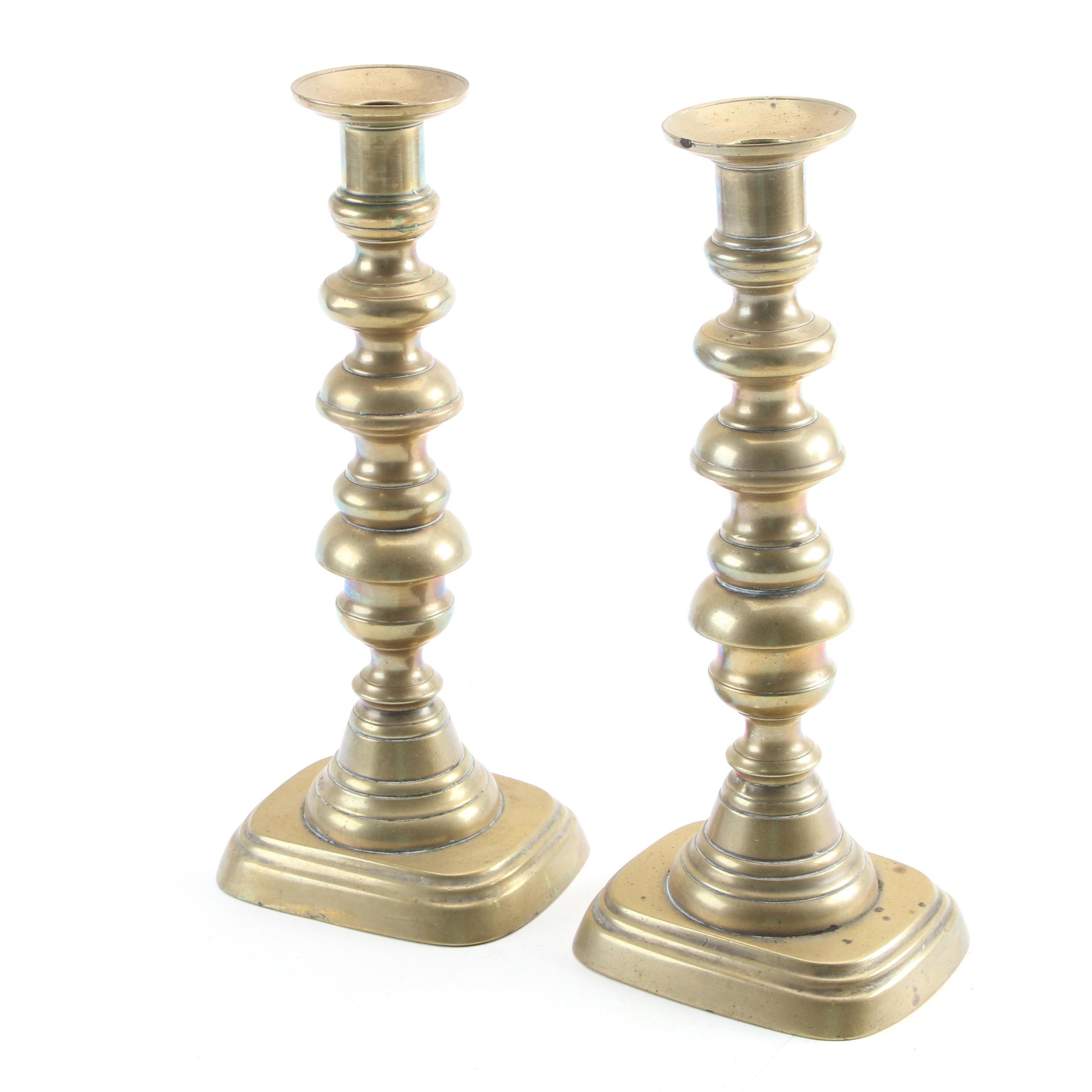 English Push-Up and Other Brass Candlesticks