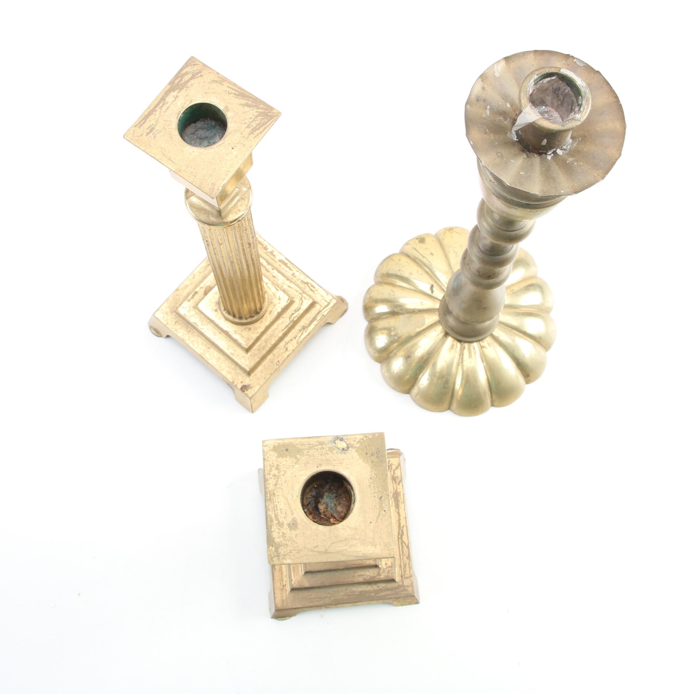 English Push-Up and Other Brass Candlesticks