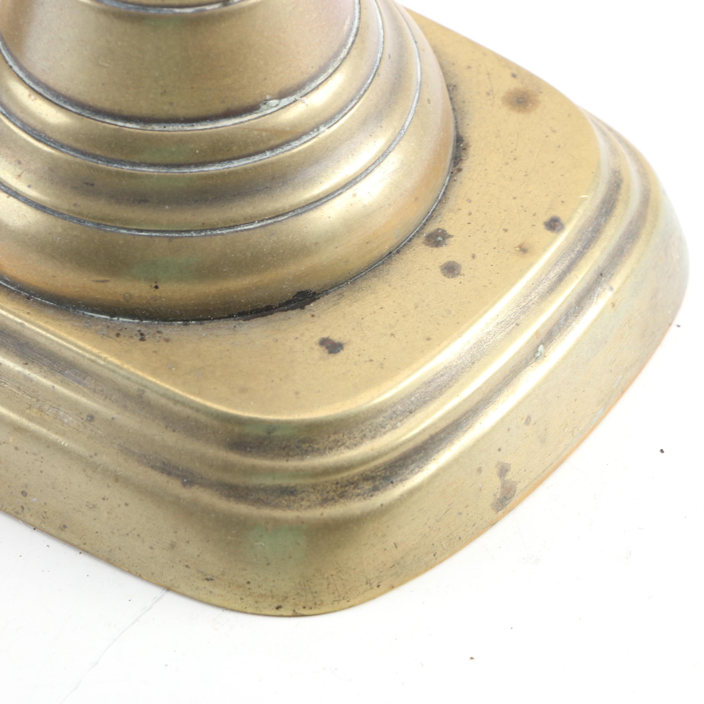 English Push-Up and Other Brass Candlesticks