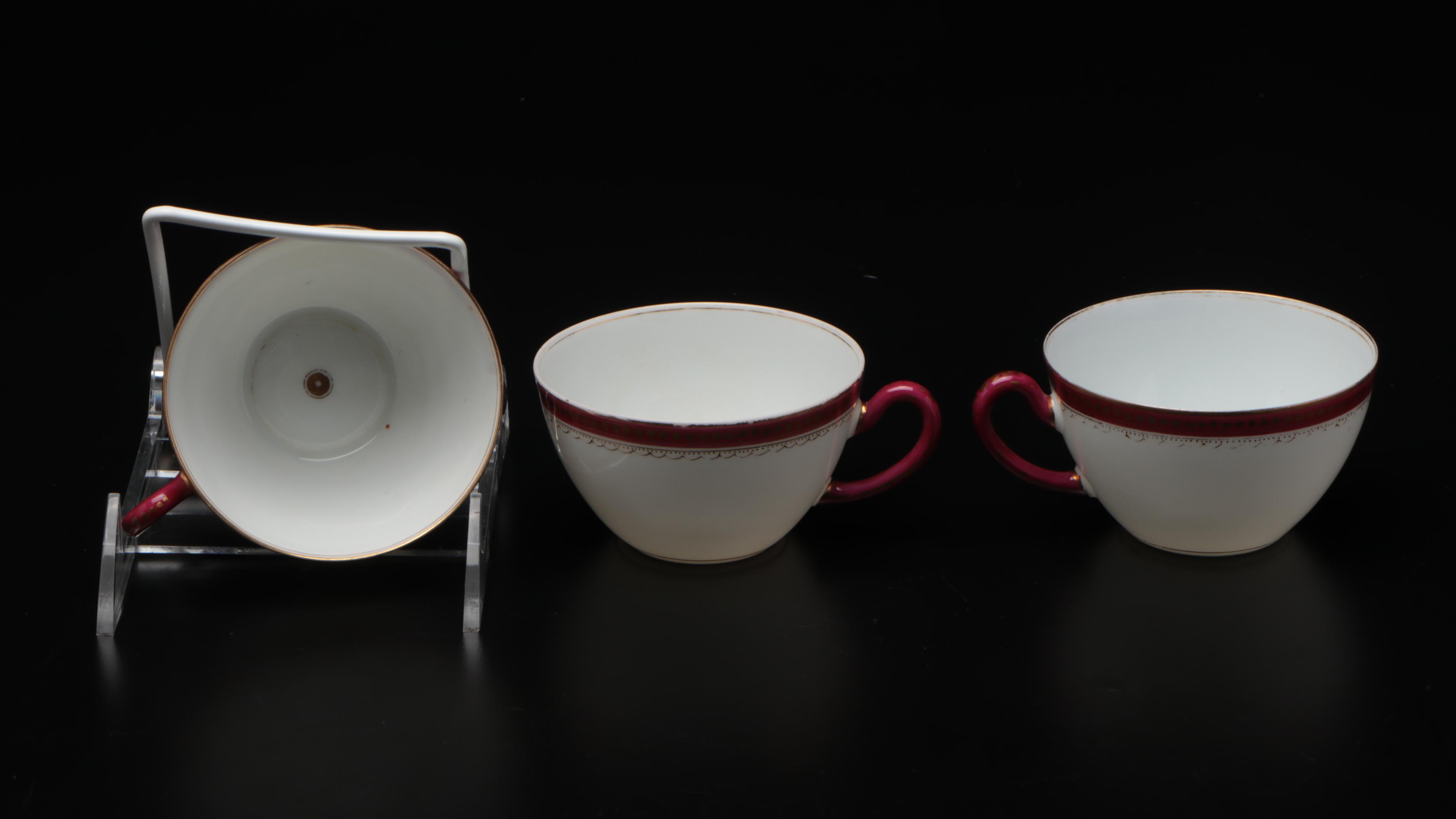 European Gilt Accented Porcelain Teacups and Dessert Plates