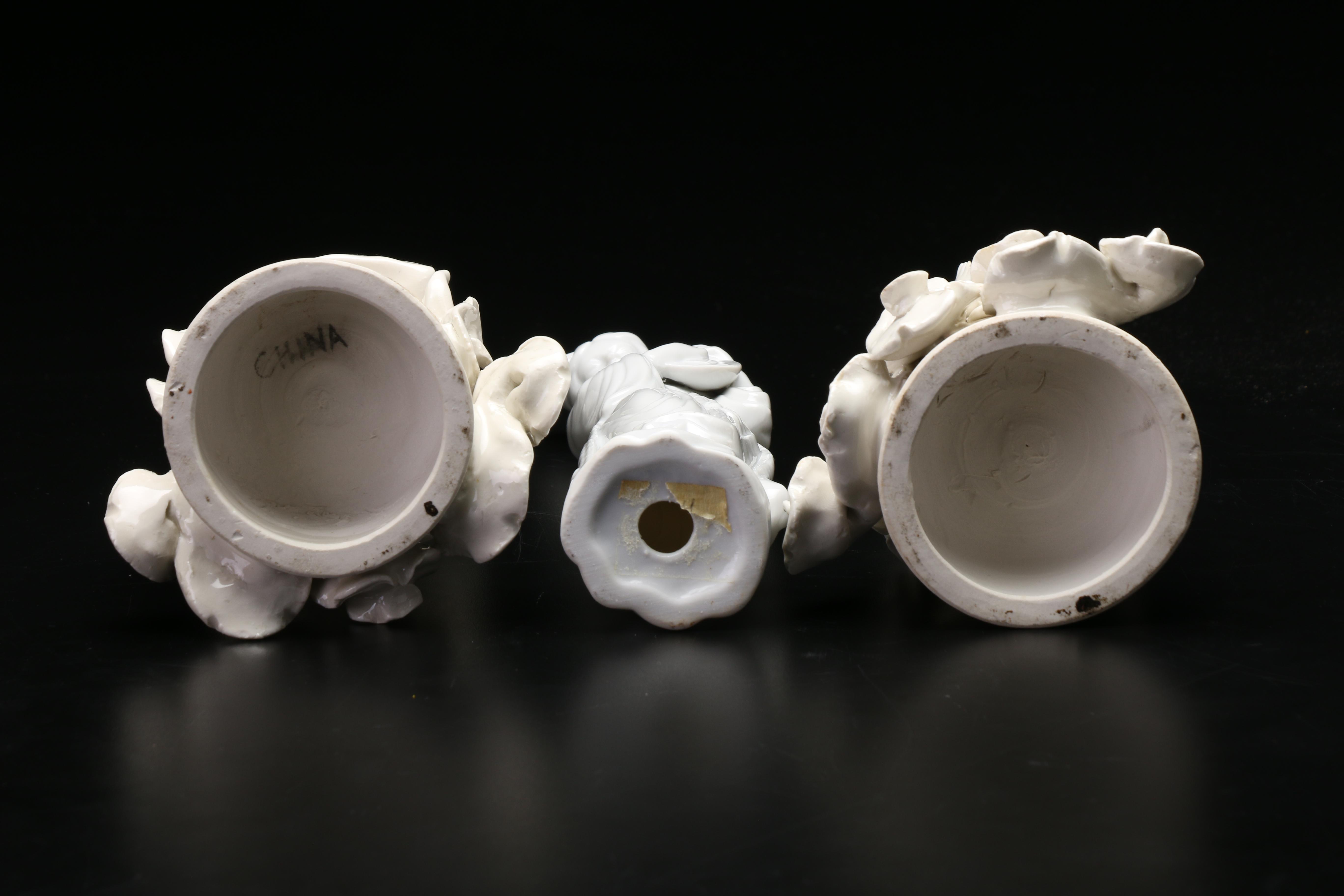 Chinese Blanc de Chine Figurines with Carved Wooden Stands