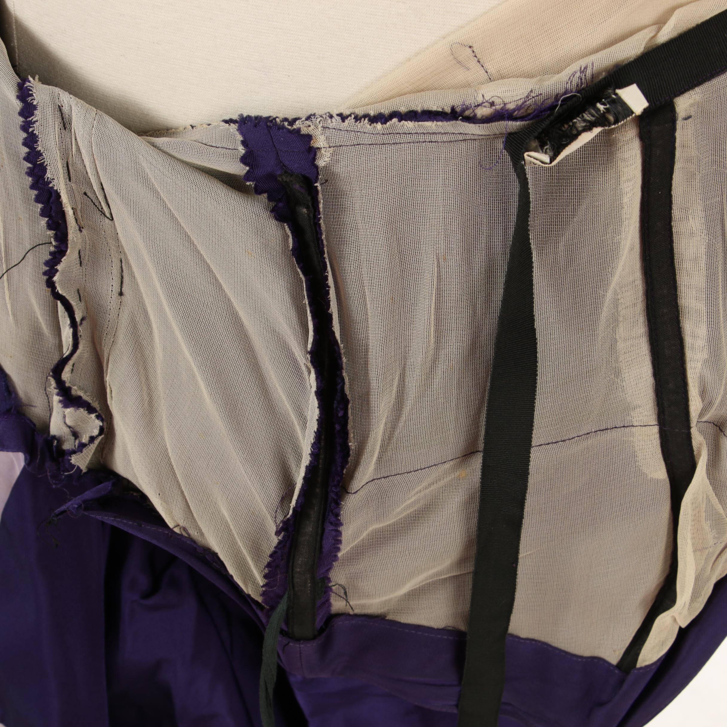 Modern Couture Black Sleeveless Evening Dress and Other Purple Strapless Gown