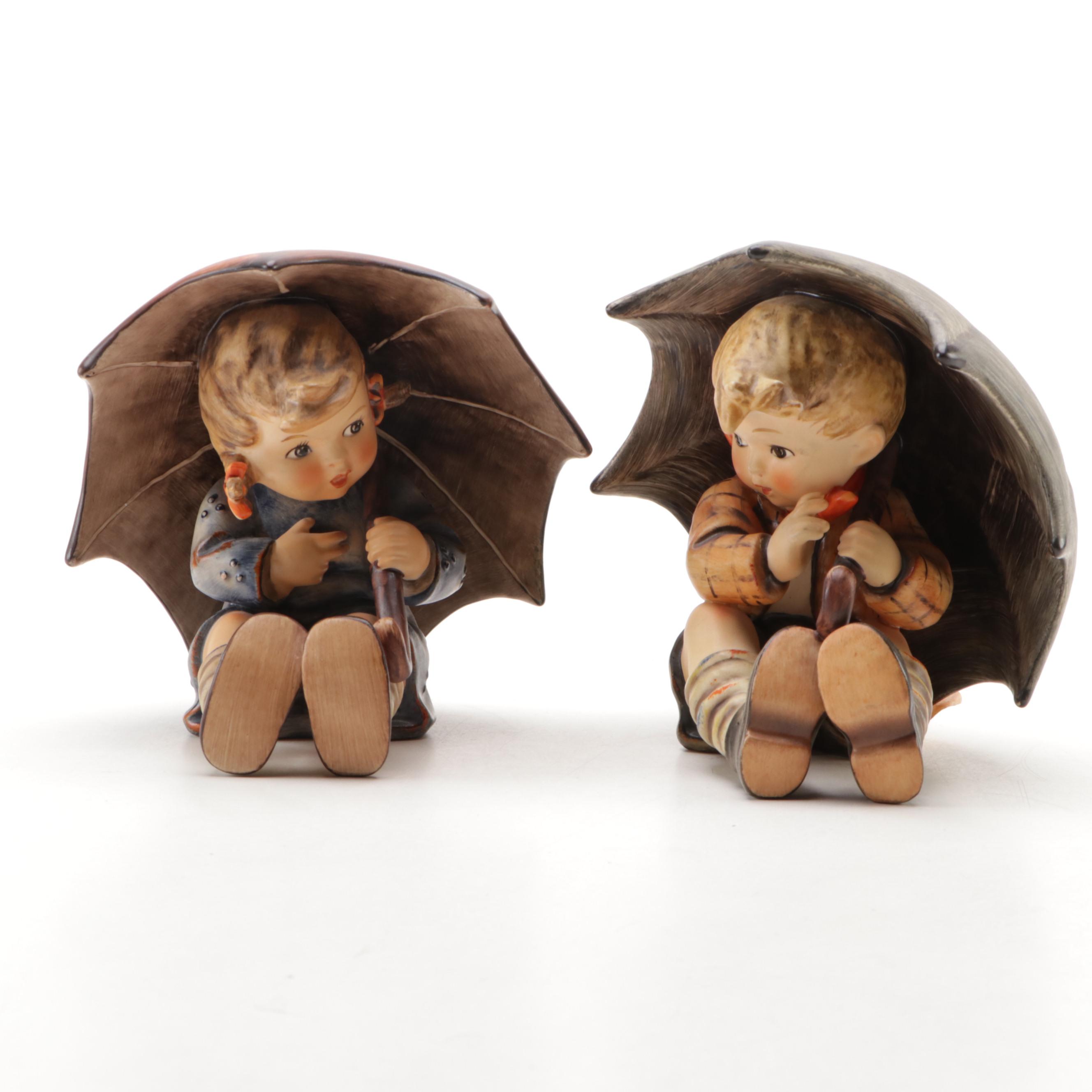 Goebel "Umbrella Boy" and "Umbrella Girl" Porcelain Hummel Figurines