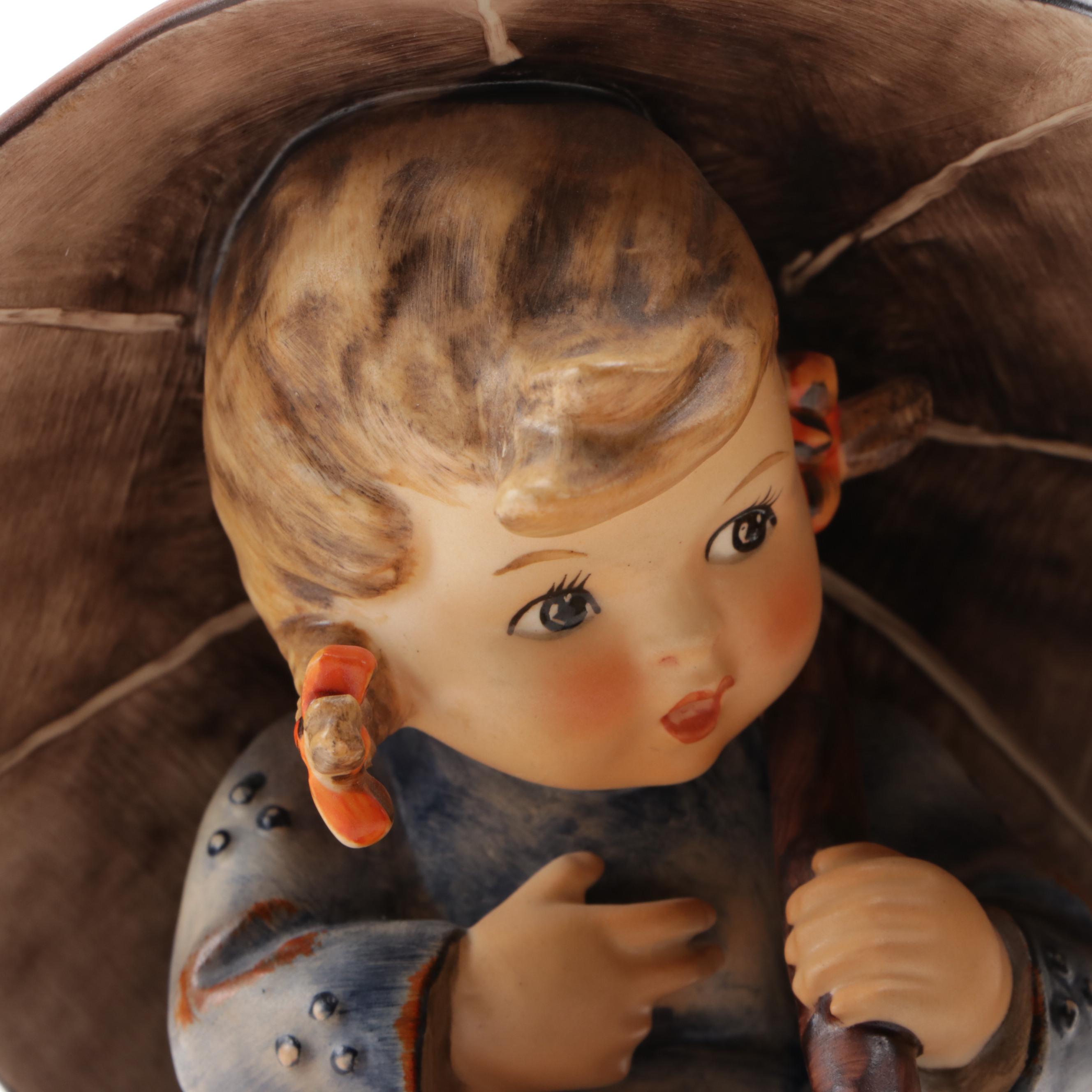 Goebel "Umbrella Boy" and "Umbrella Girl" Porcelain Hummel Figurines