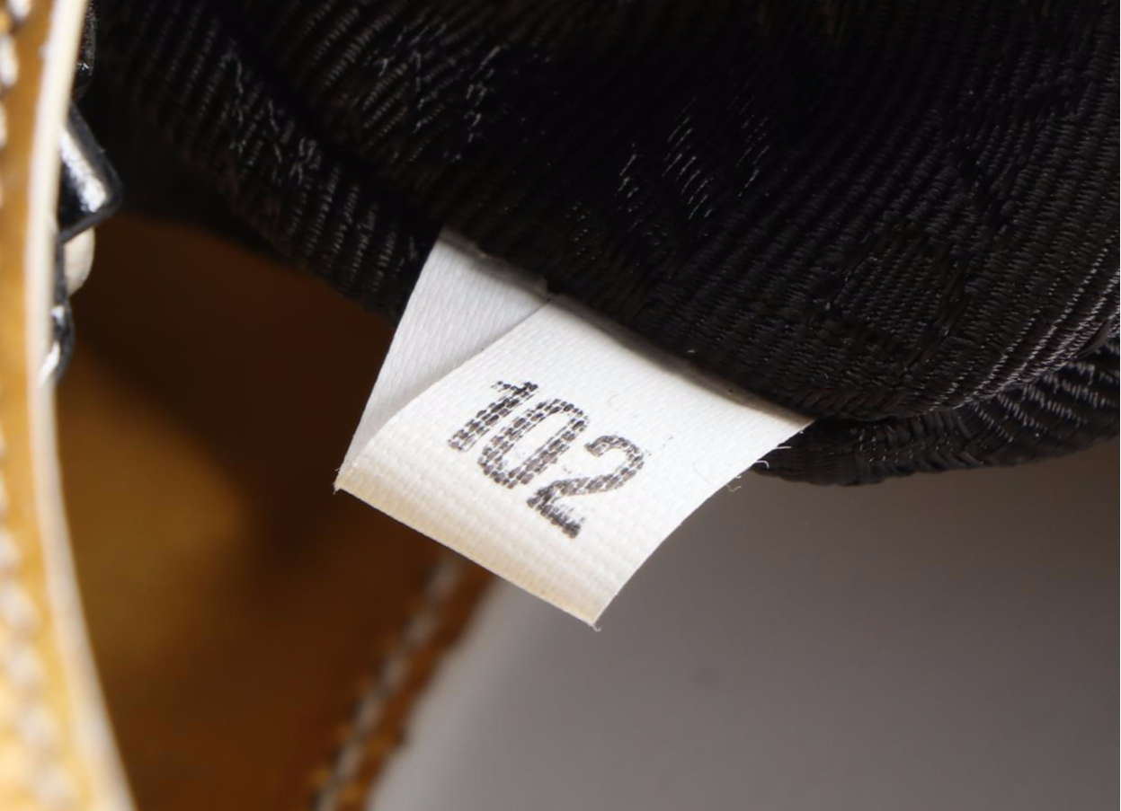 Prada Slim Structured Hobo Bag in Metallic Gold Patent Leather