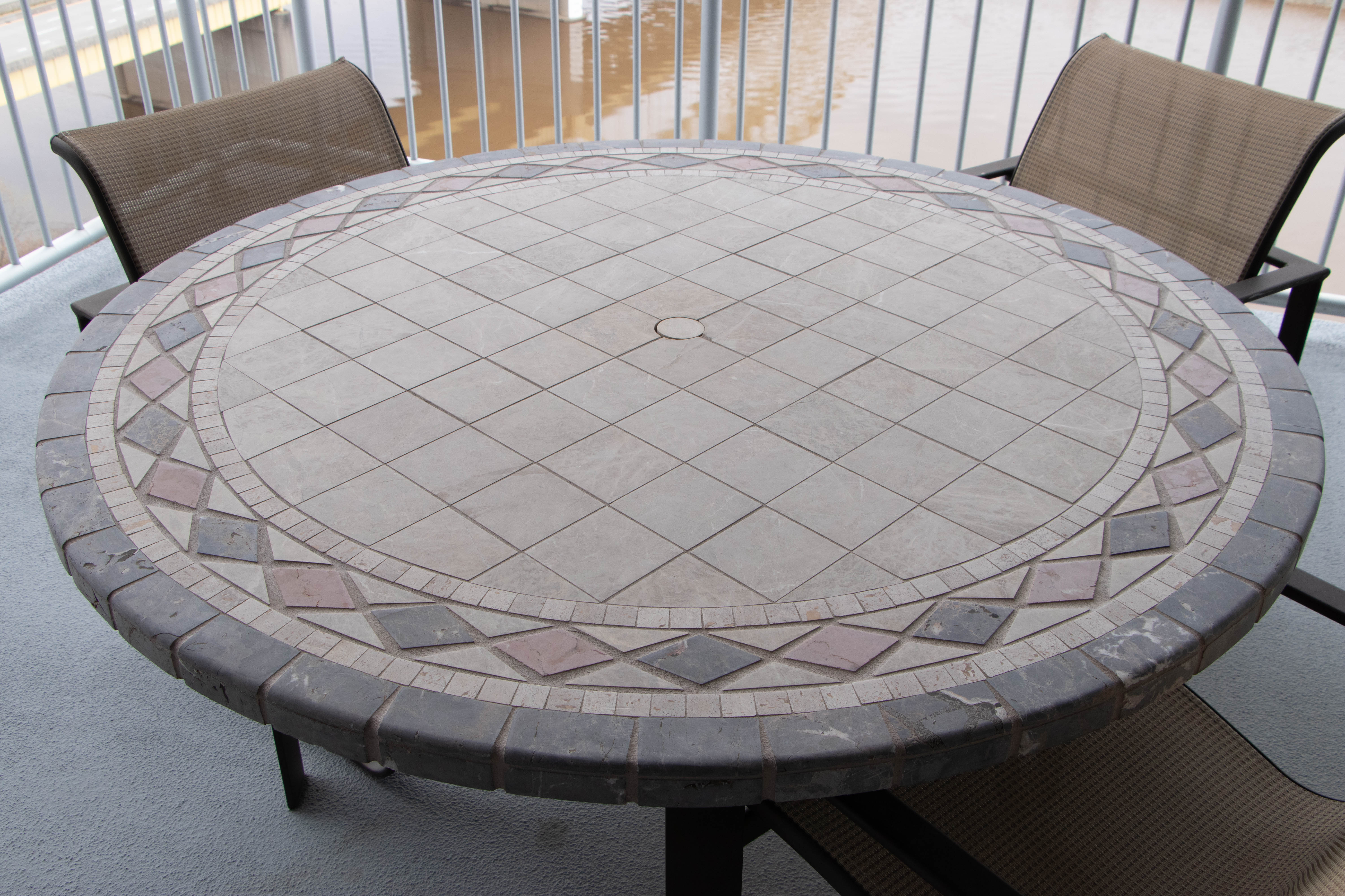 Brown Jordan Stone Top Patio Table and Armchairs