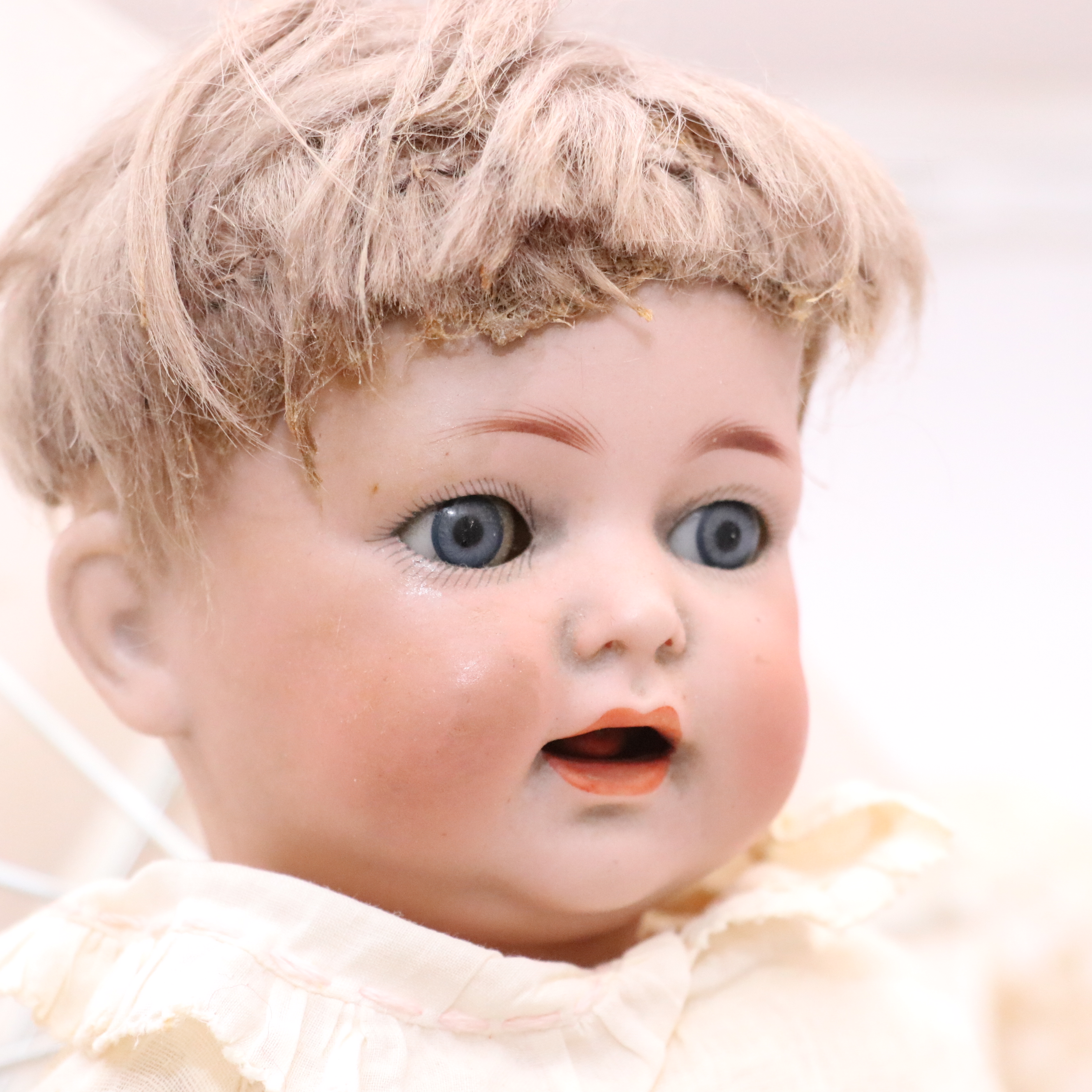 K Star R 122 Character Baby Doll with Victorian Ball and Stick Canopy Pram