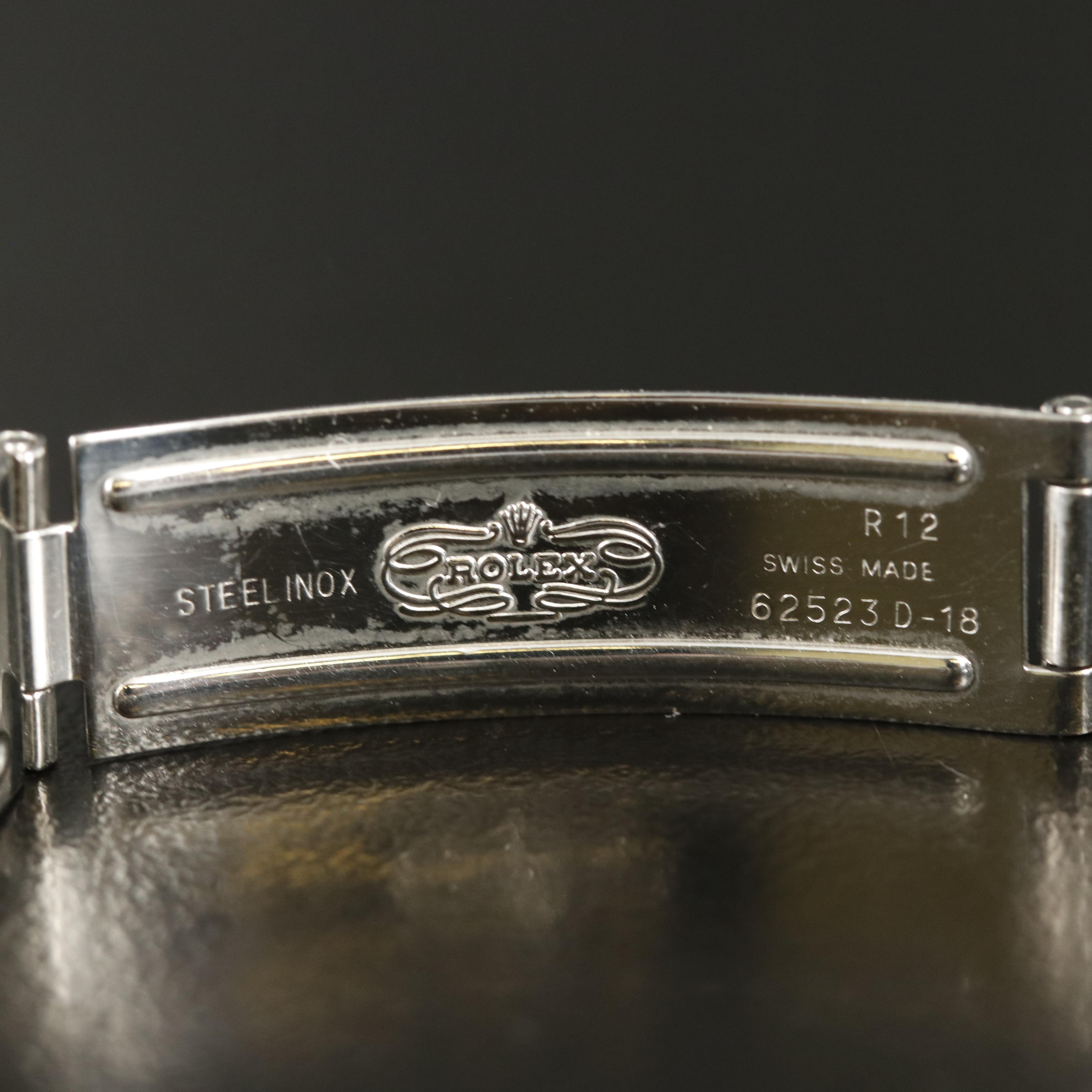 1991 Rolex Datejust Gold Roman, Ivory Pyramid Dial Watch