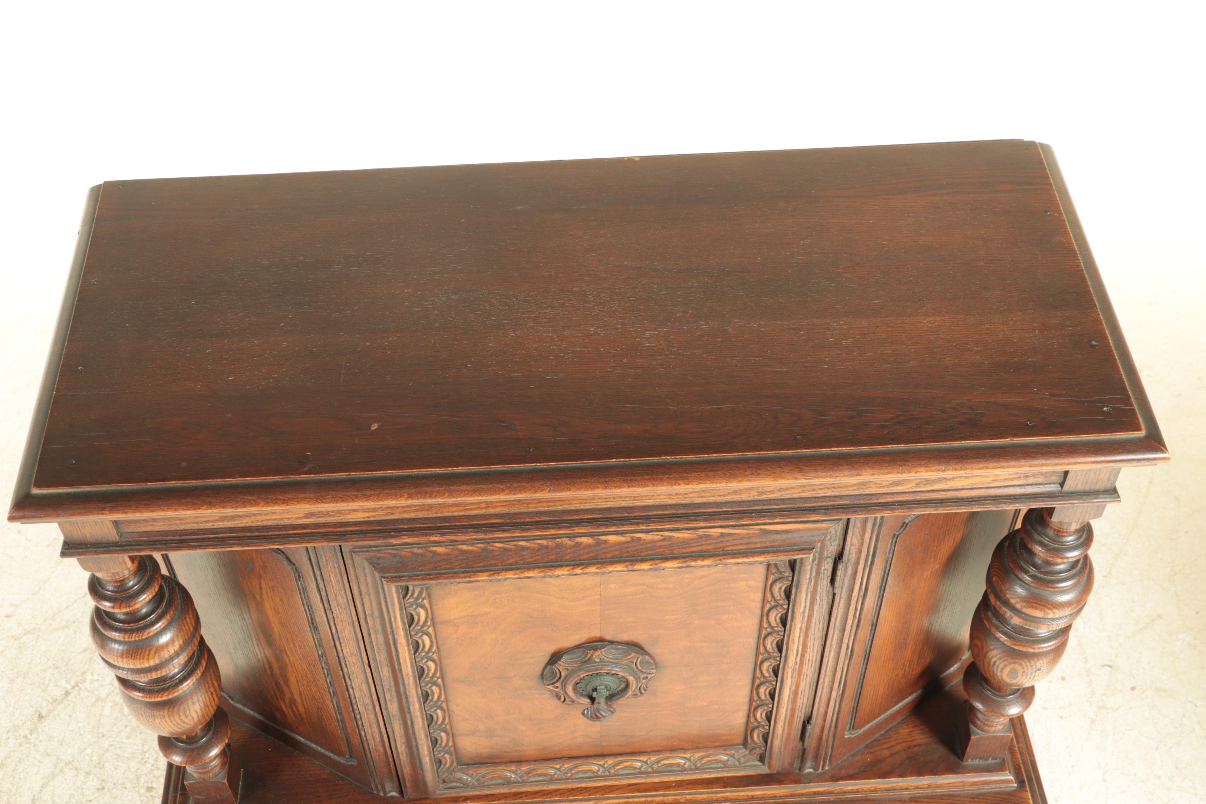 Stille & Duhlmeier Co. Jacobean Style Oak China Cabinet, 1940s