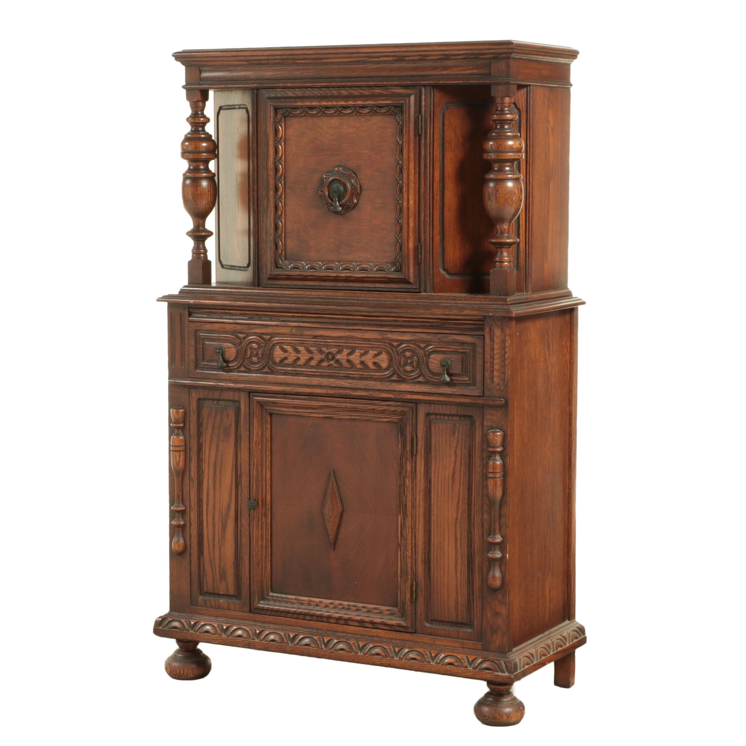 Stille & Duhlmeier Co. Jacobean Style Oak China Cabinet, 1940s
