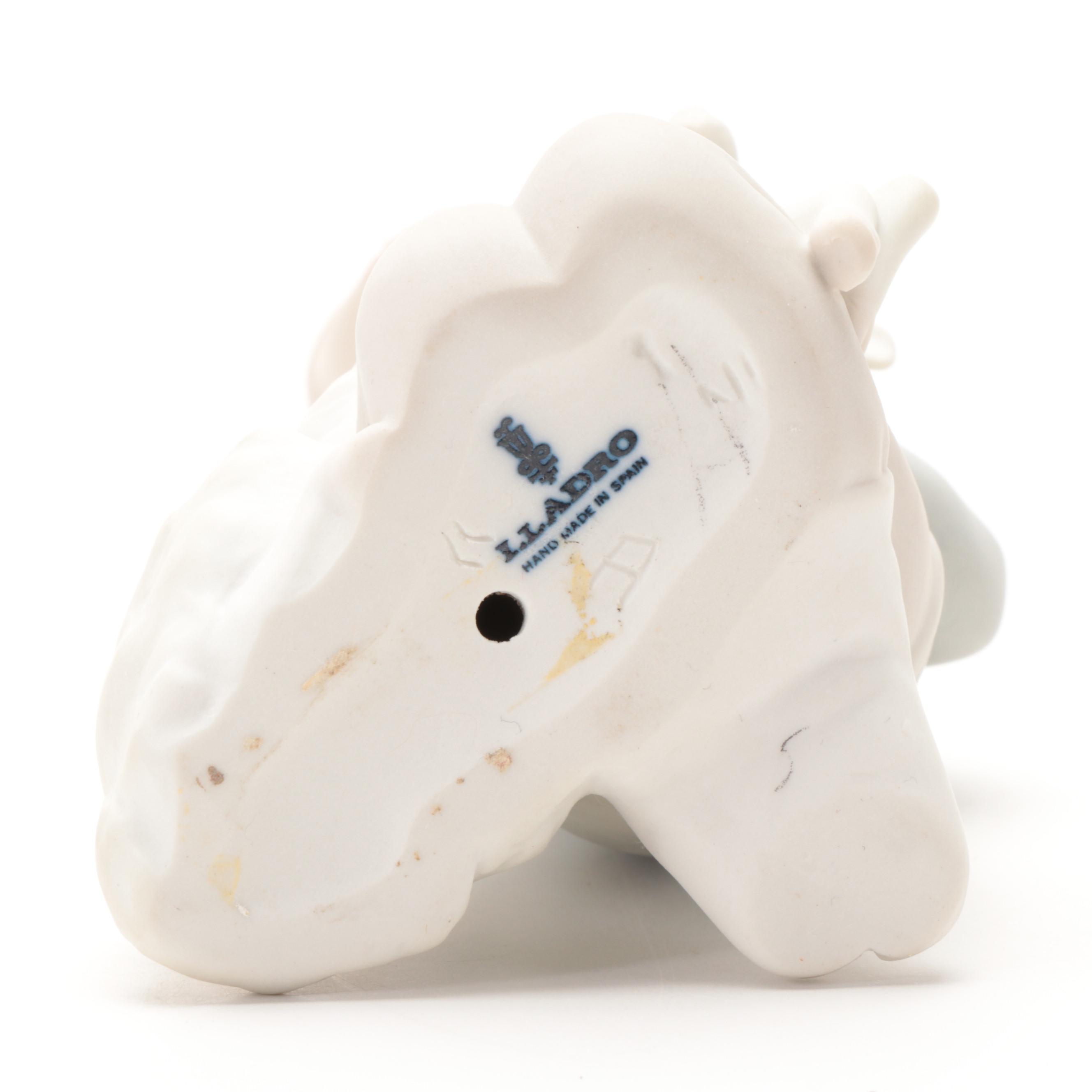 Lladró "Girl with Hands Akimbo" and Other Matte Porcelain Figurines