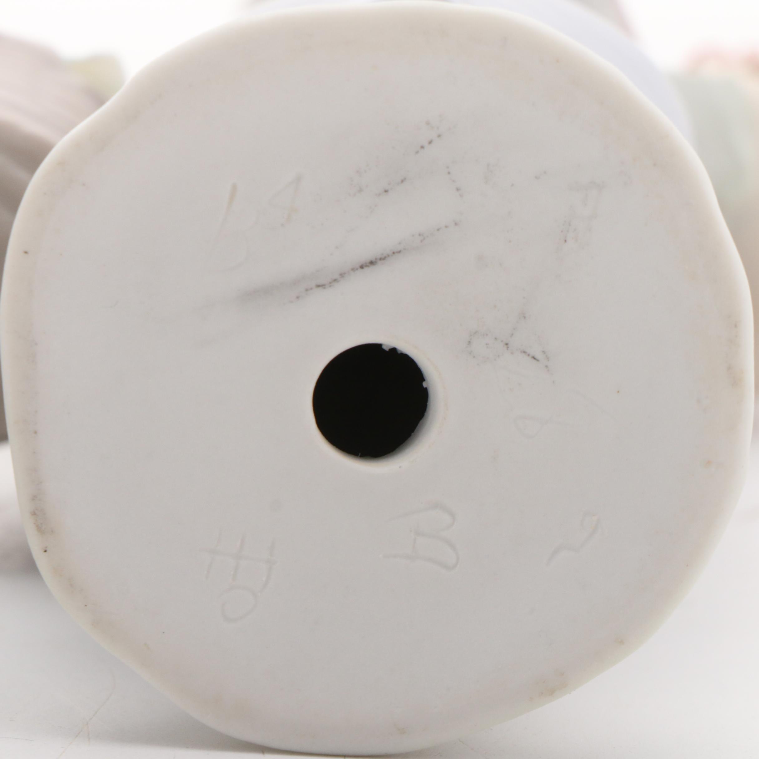 Lladró "Girl Gathering Flowers" and Lladró Style "Lupita" Porcelain Figurines