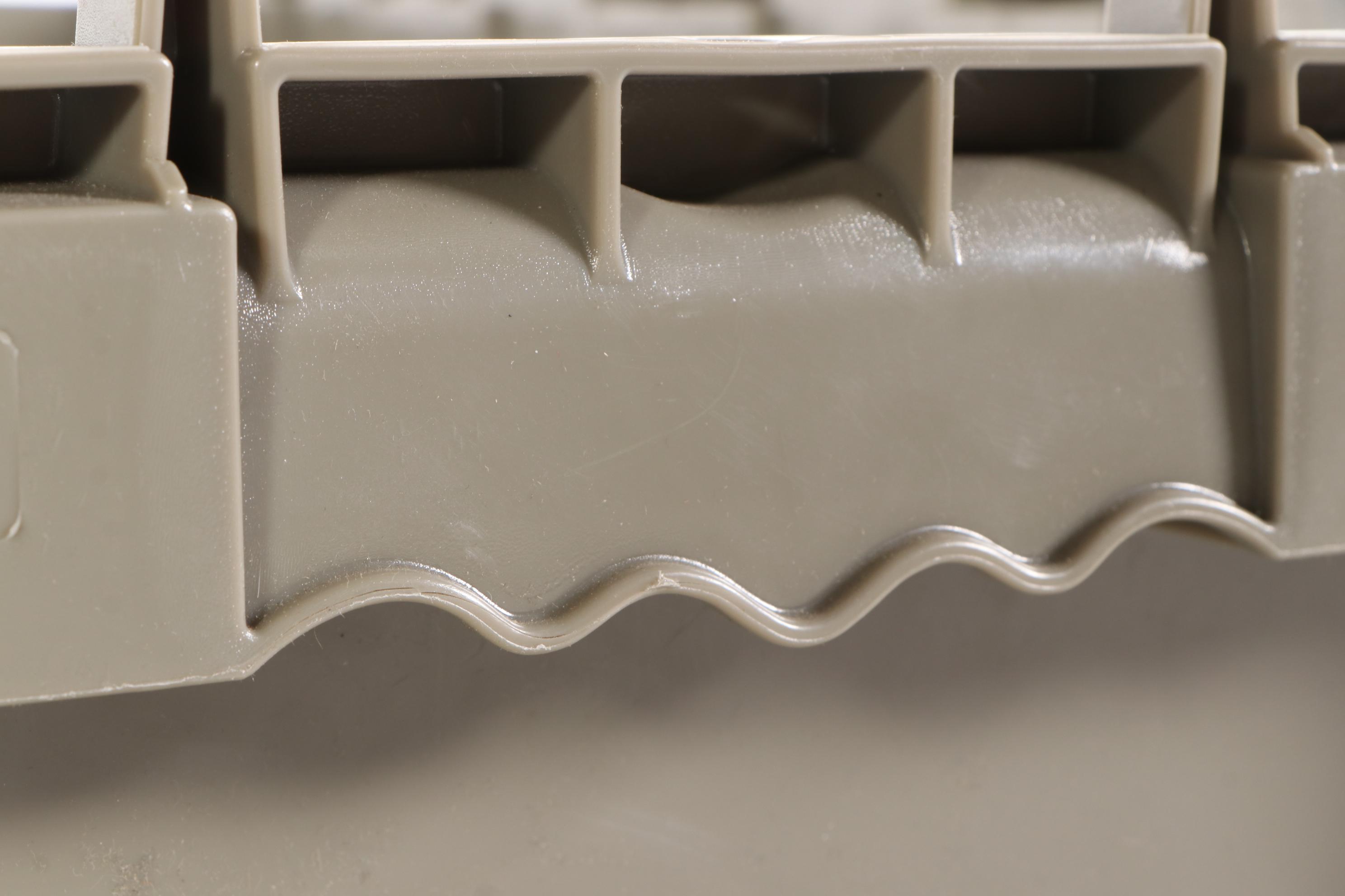 Five Gray Plastic Storage Totes