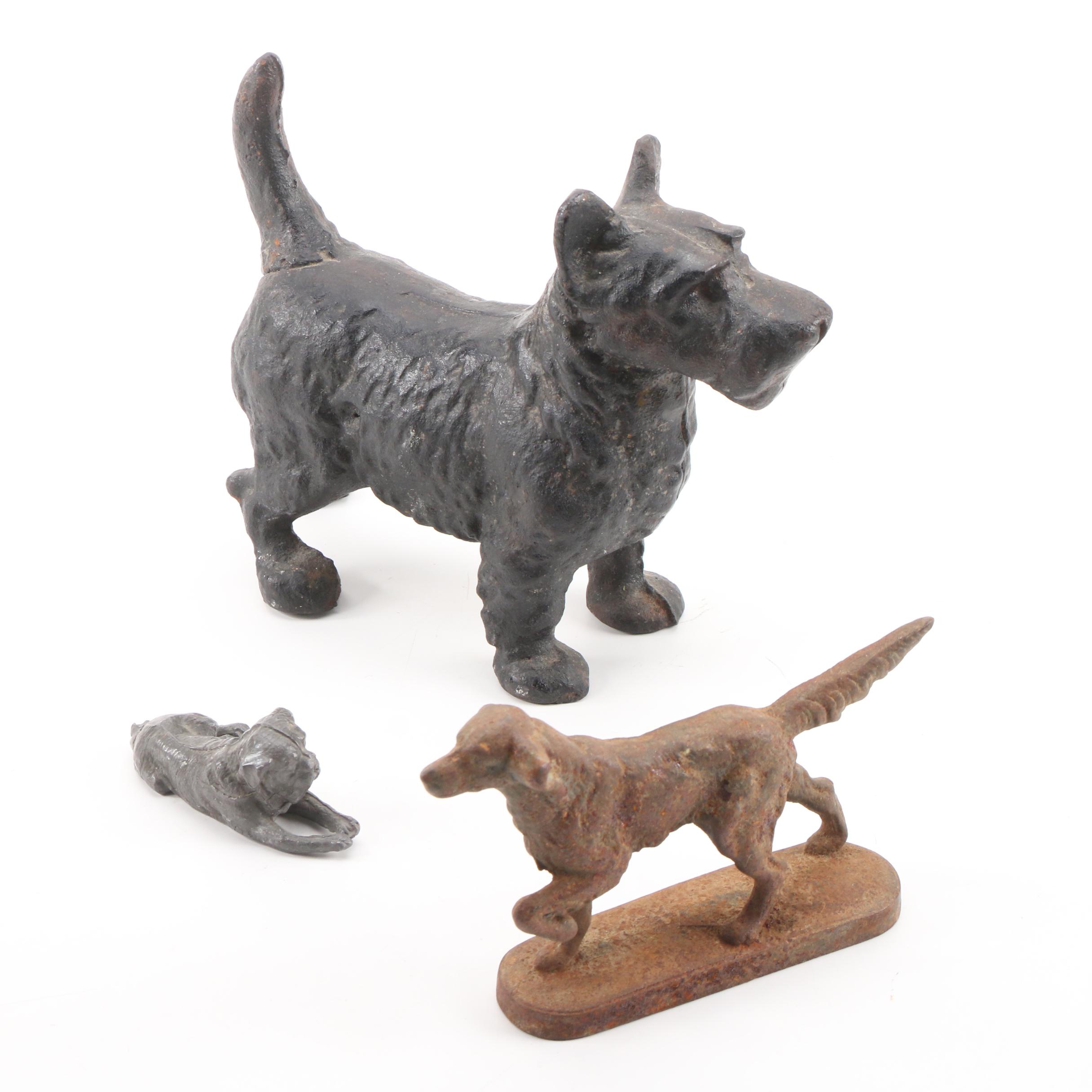 Cast Iron Scottie Dog Doorstop with Other Dog Figurines, Early to Mid-20th C.