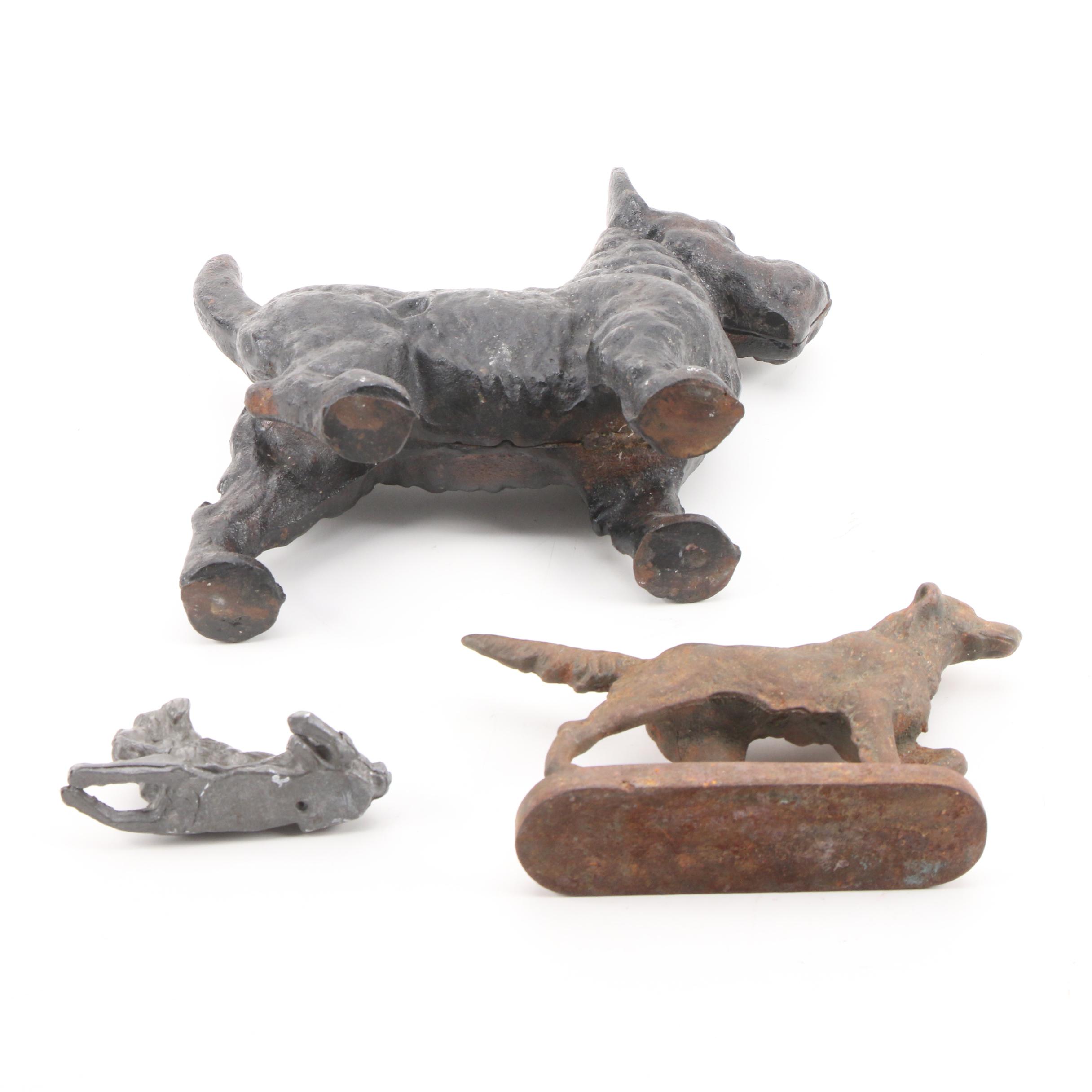 Cast Iron Scottie Dog Doorstop with Other Dog Figurines, Early to Mid-20th C.