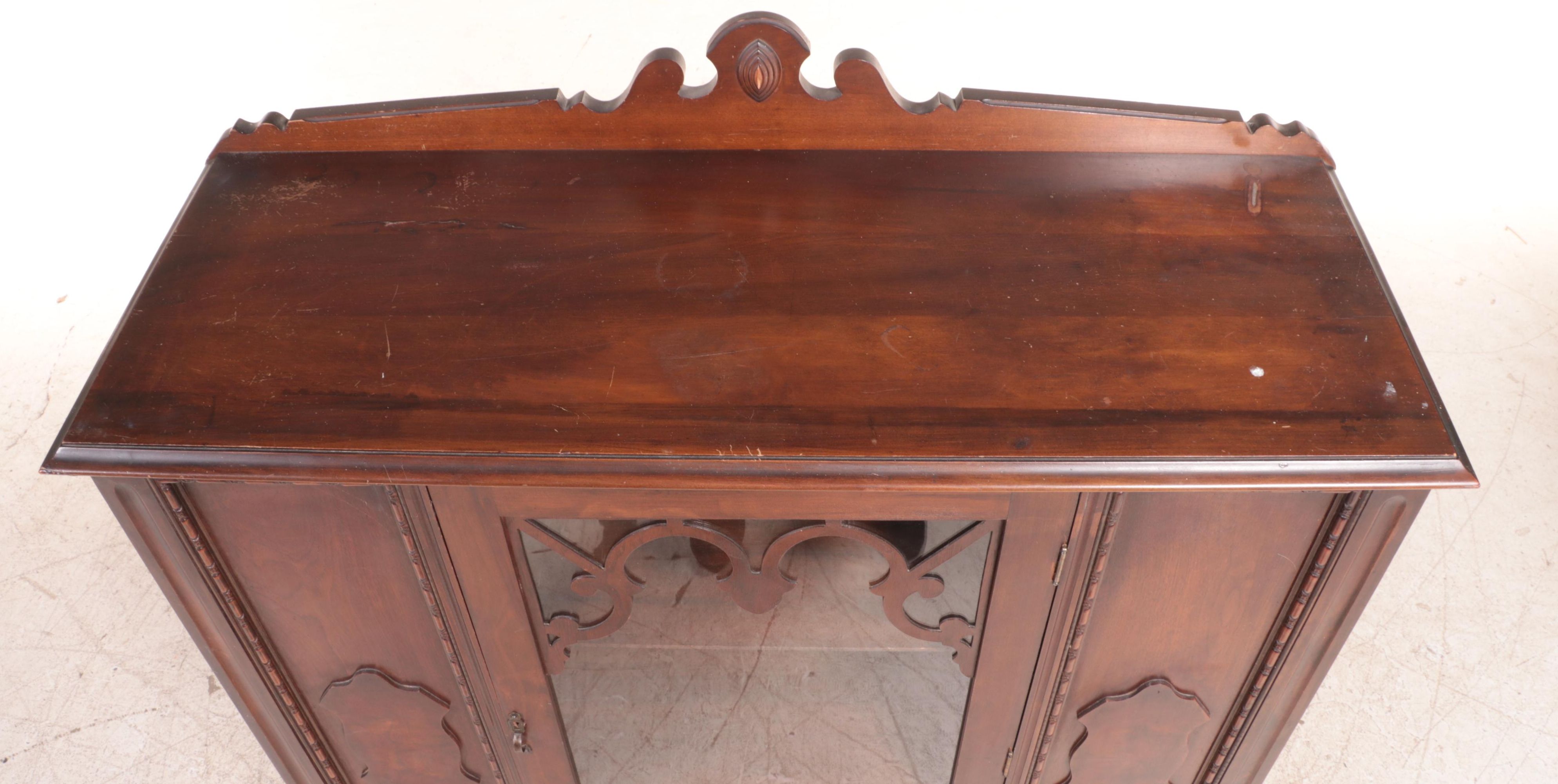 C.F. Schmoe Furniture Co. Jacobean Revival Walnut China Cabinet