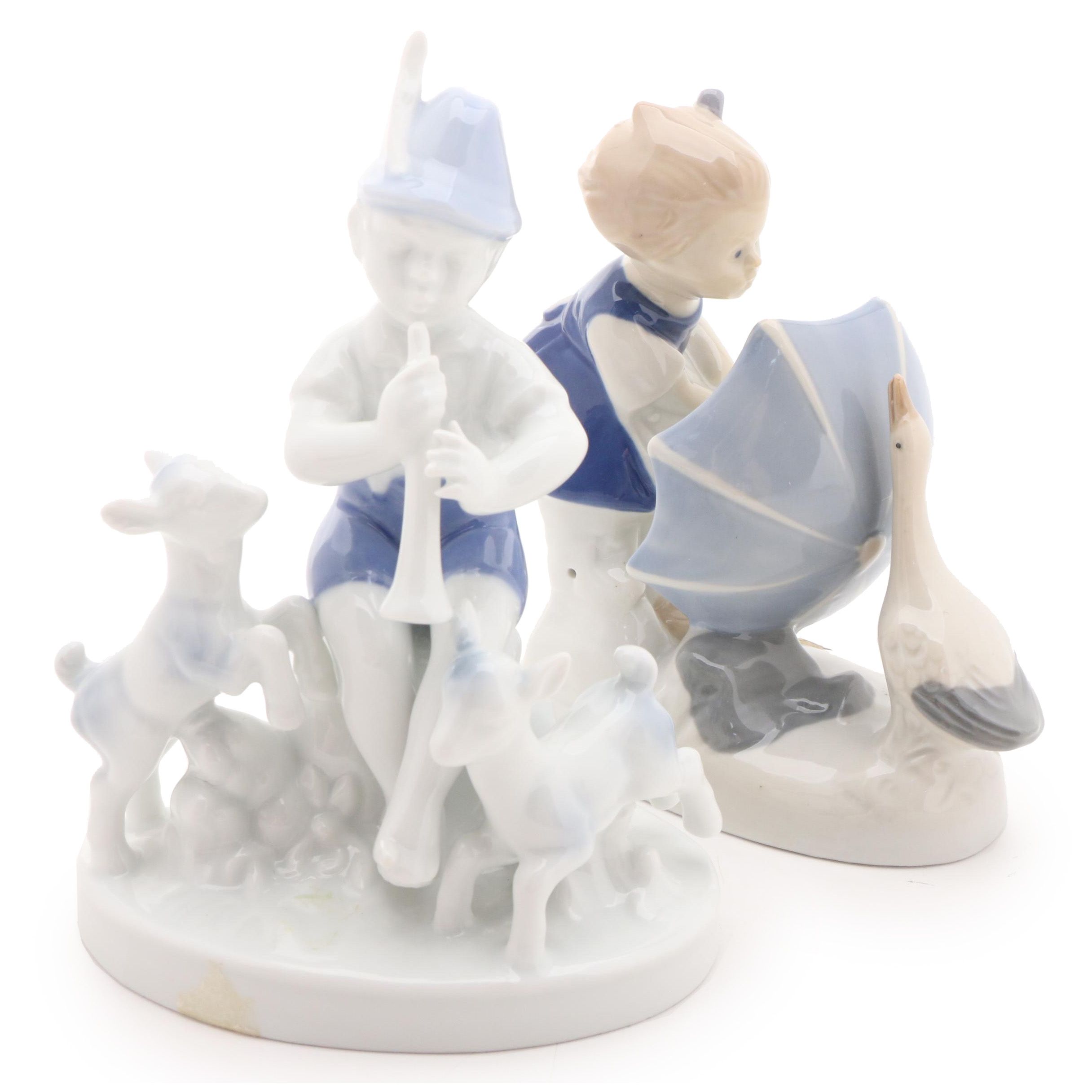Gerold Porzellan Boy with Flute and Other Girl with Umbrella Porcelain Figurine