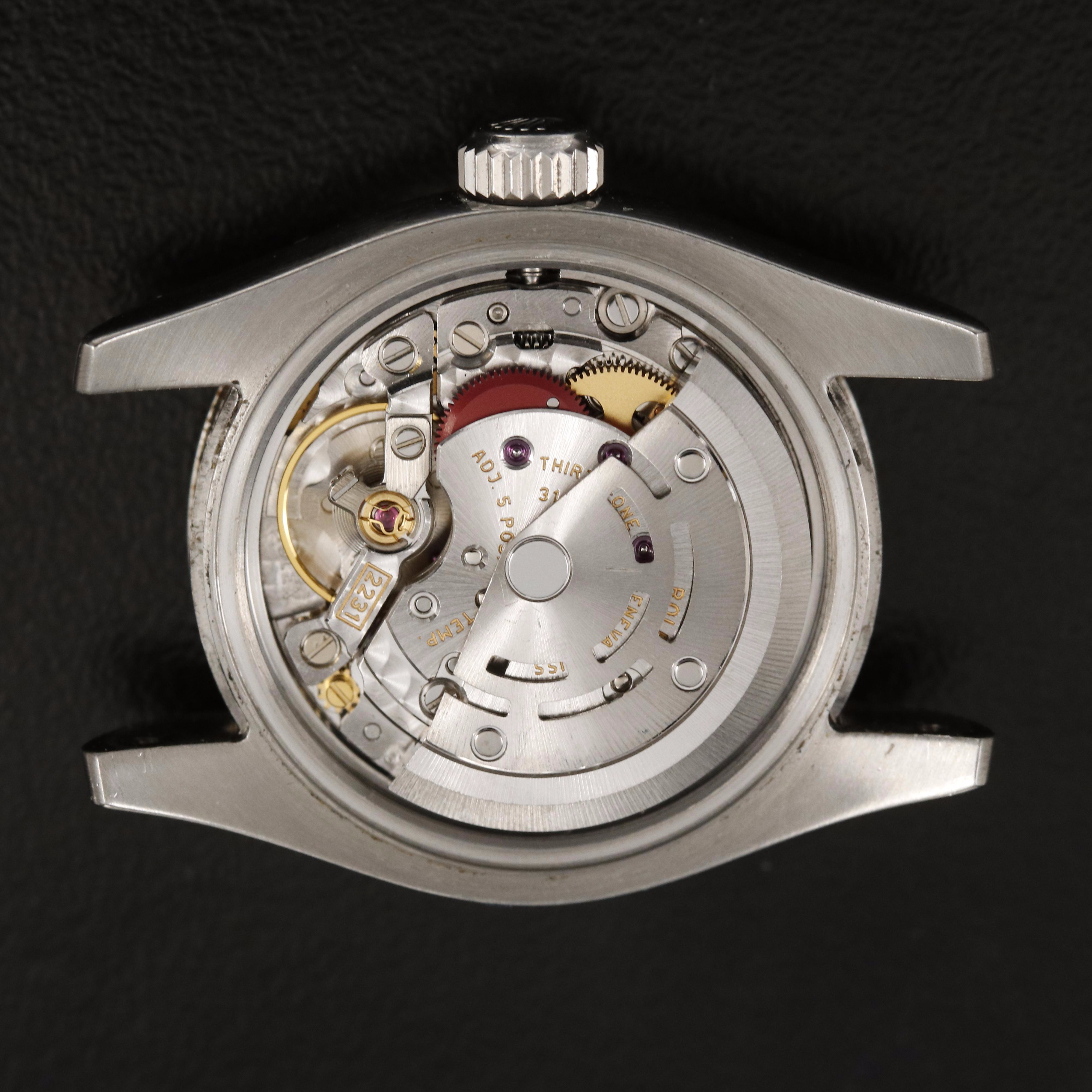 Rolex Oyster Perpetual Black Arabic Pink Markers Watch