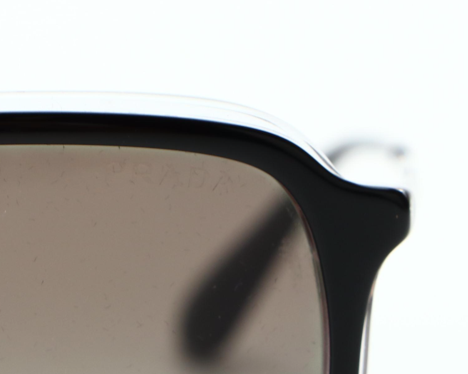 Prada SPR06V Metal-Clear-Black Frame Sunglasses with Grey Gradient Lens