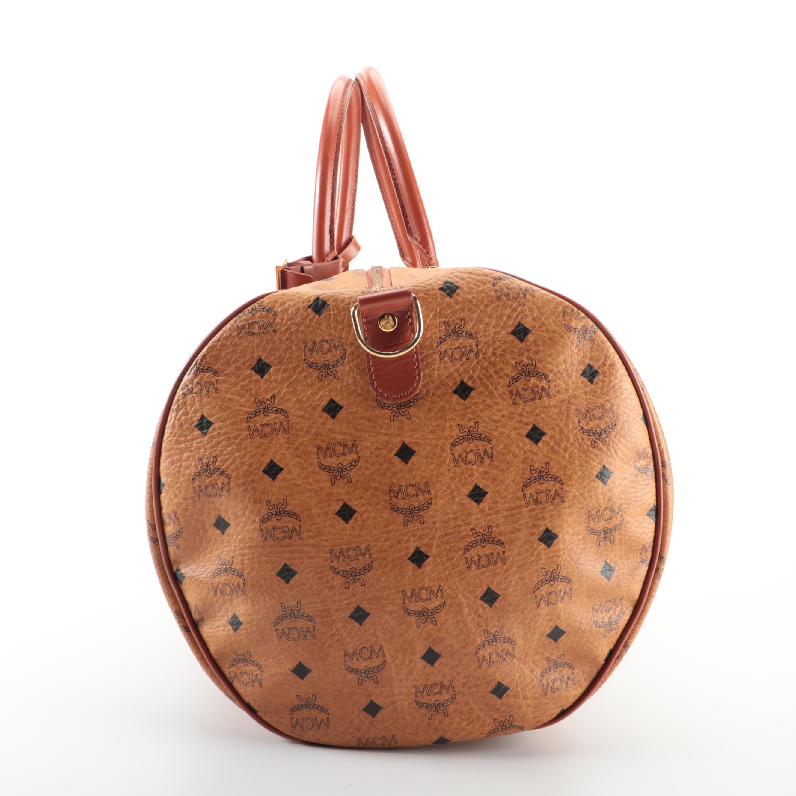 MCM Travel Bag in Cognac Monogram Visetos and Leather with Detachable Strap