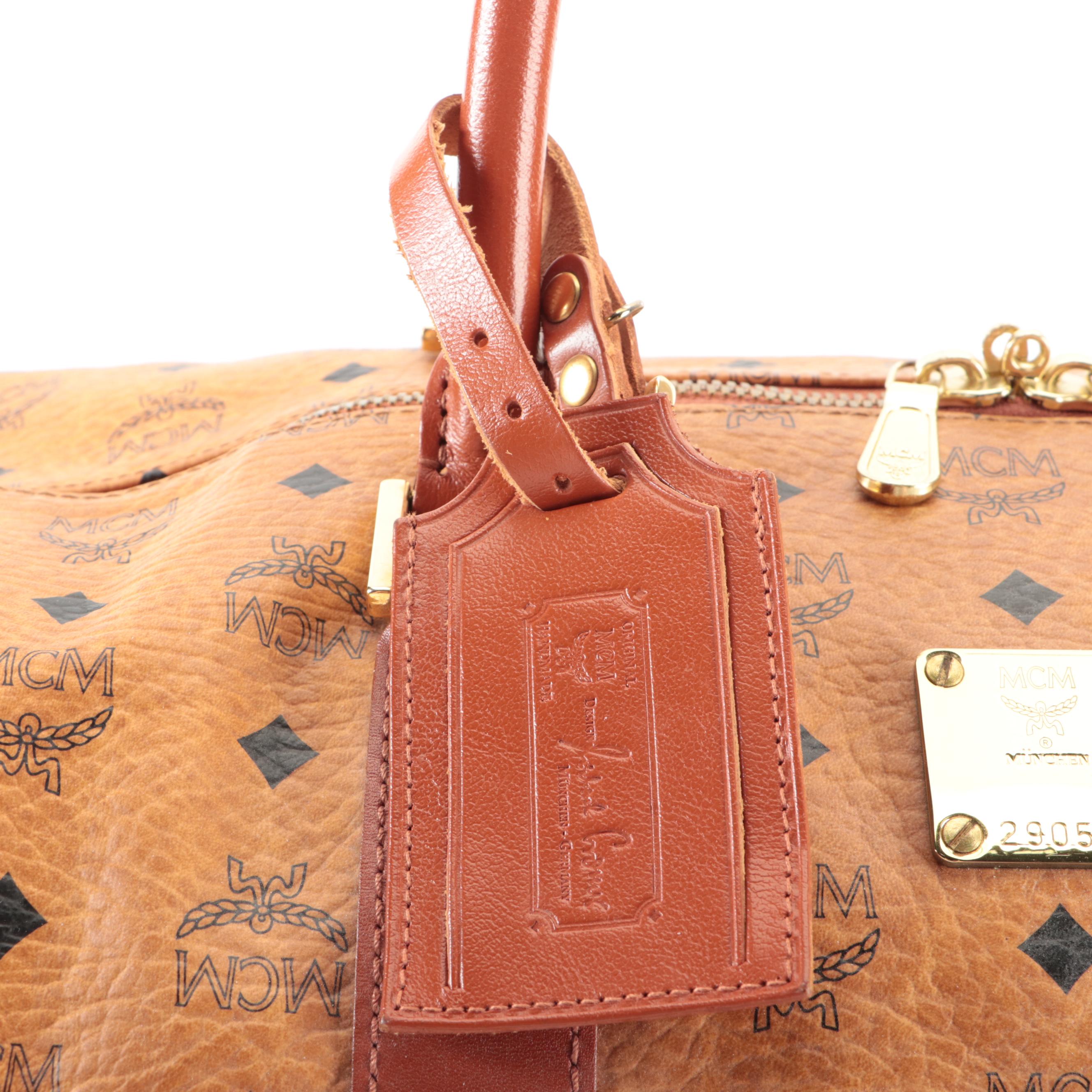 MCM Travel Bag in Cognac Monogram Visetos and Leather with Detachable Strap
