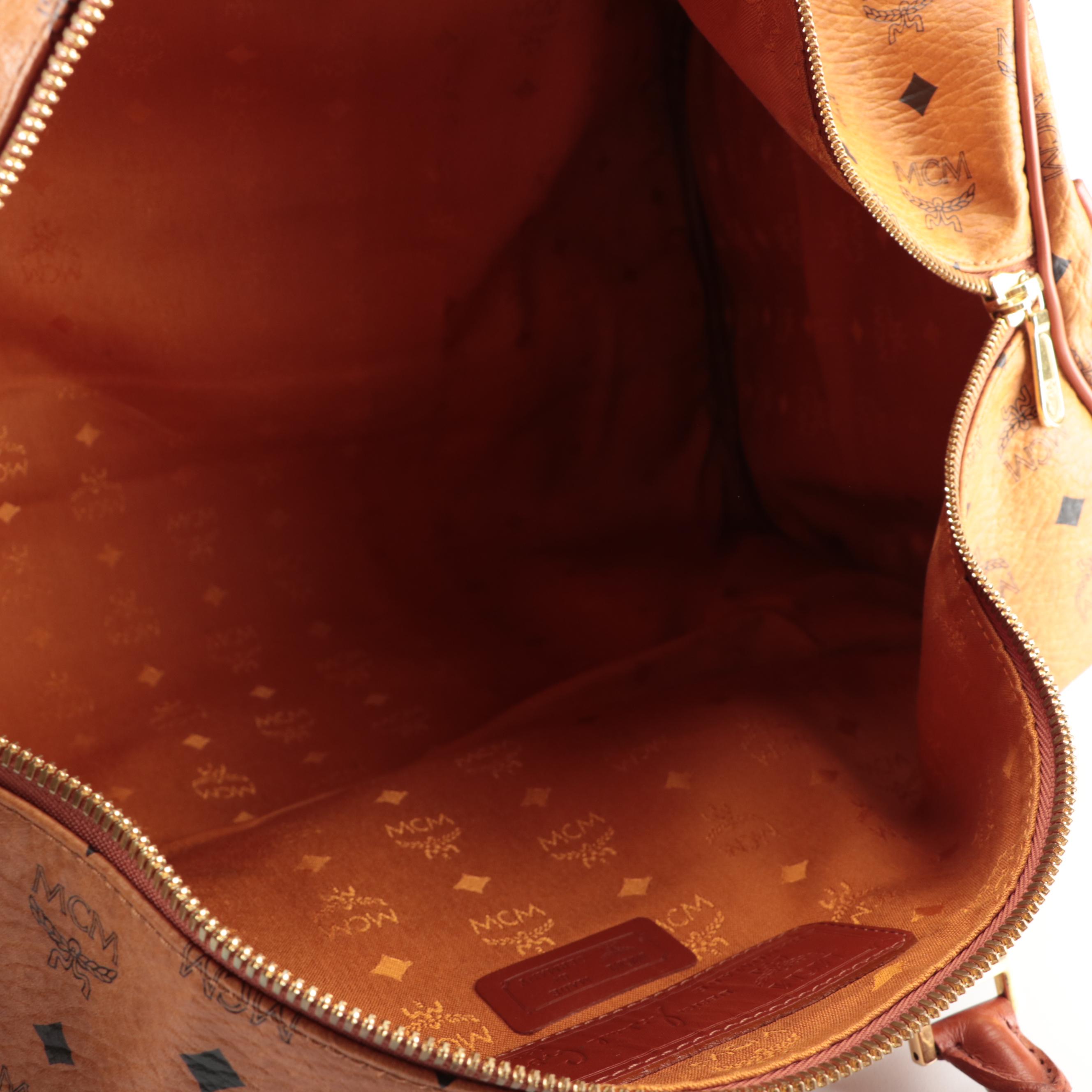 MCM Travel Bag in Cognac Monogram Visetos and Leather with Detachable Strap