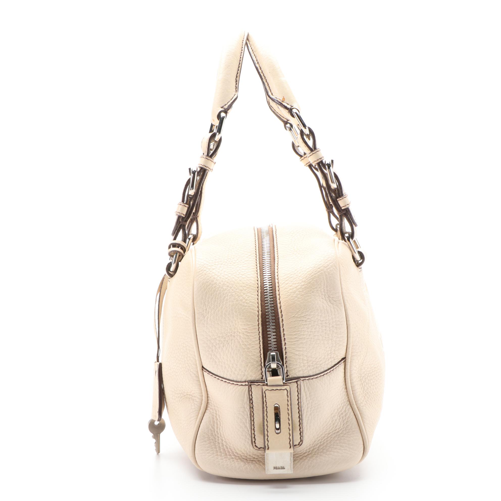 Prada Logo Embossed Vitello Daino Leather Shoulder Bag