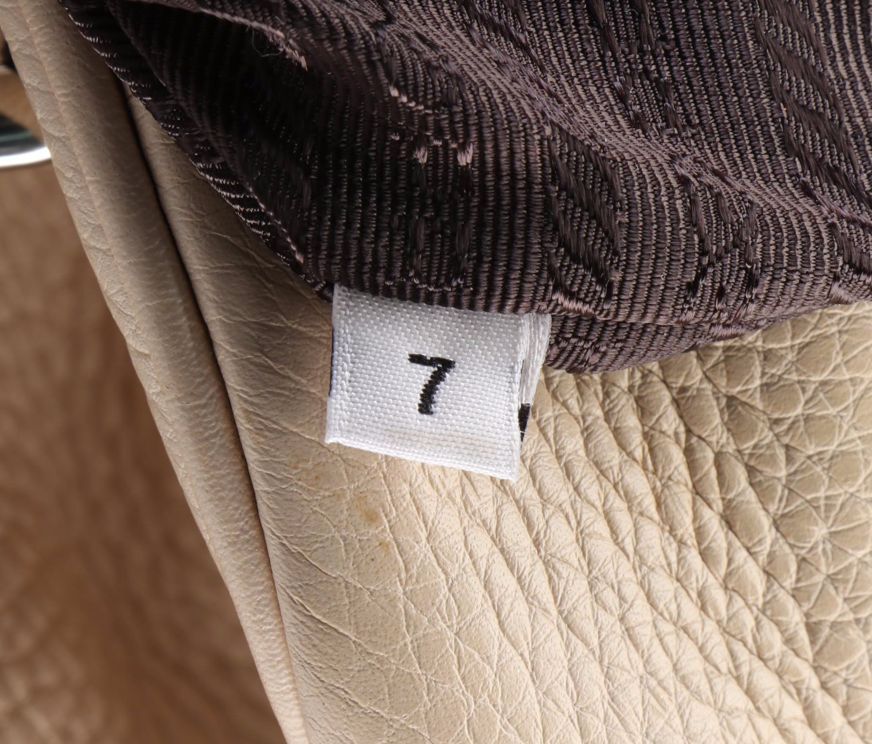 Prada Logo Embossed Vitello Daino Leather Shoulder Bag