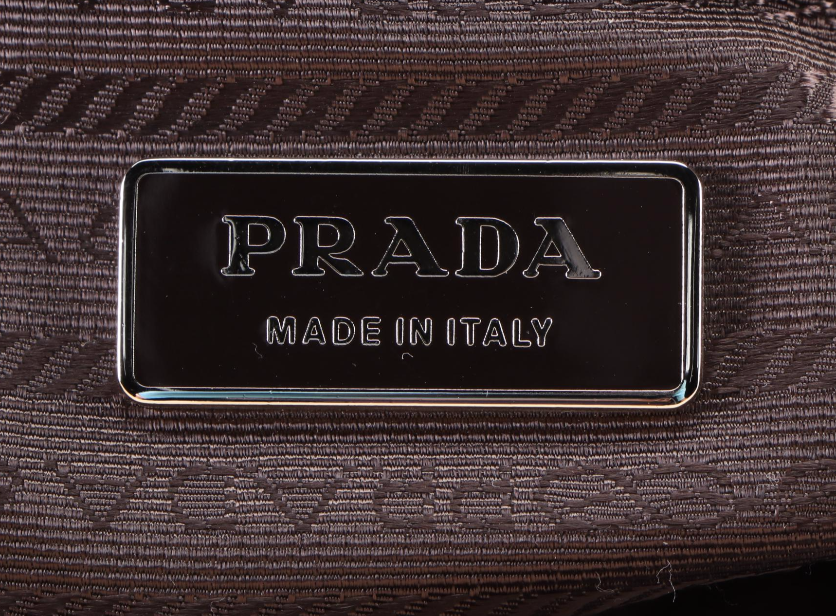 Prada Logo Embossed Vitello Daino Leather Shoulder Bag