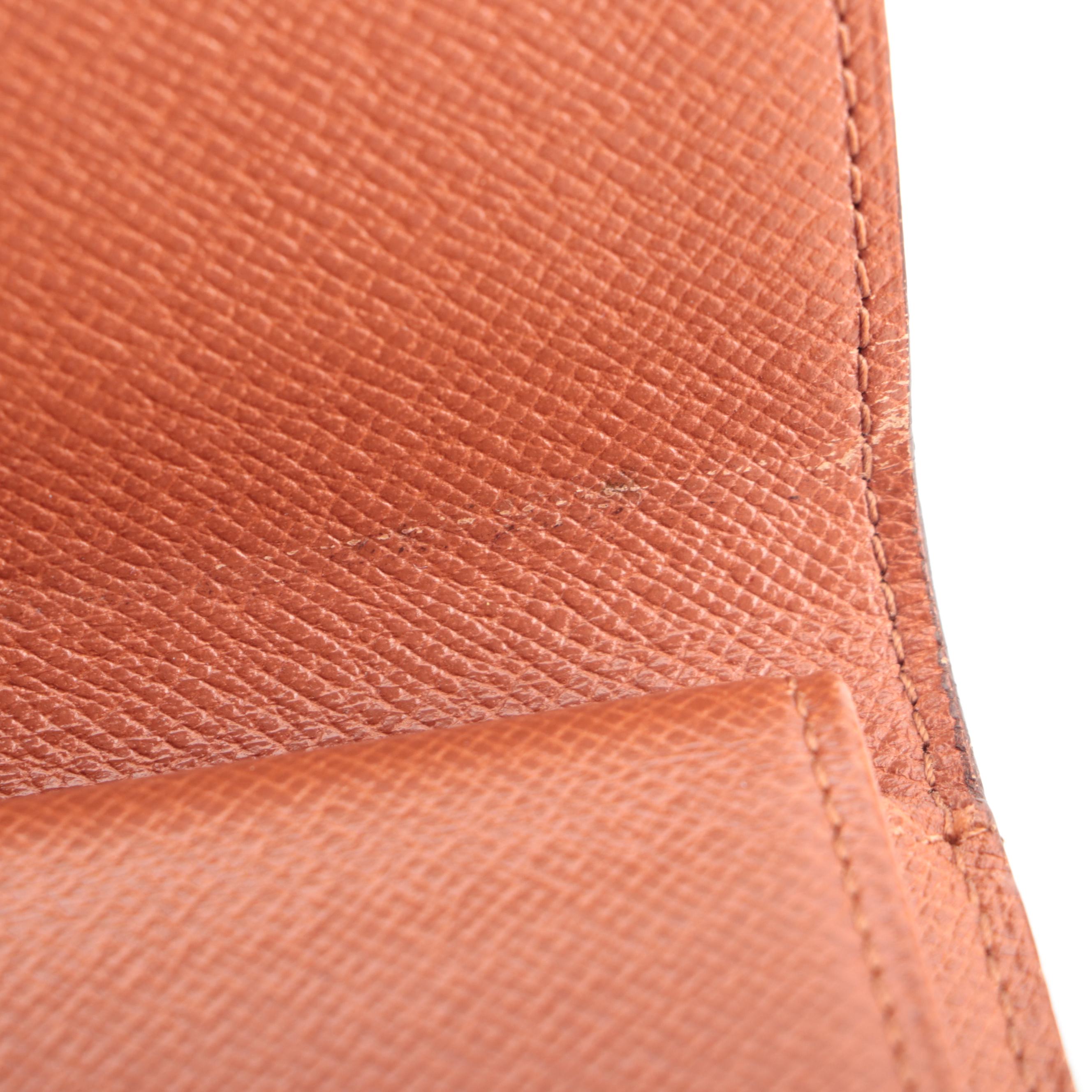 Louis Vuitton Porte-Tréssor International Wallet in Monogram Canvas