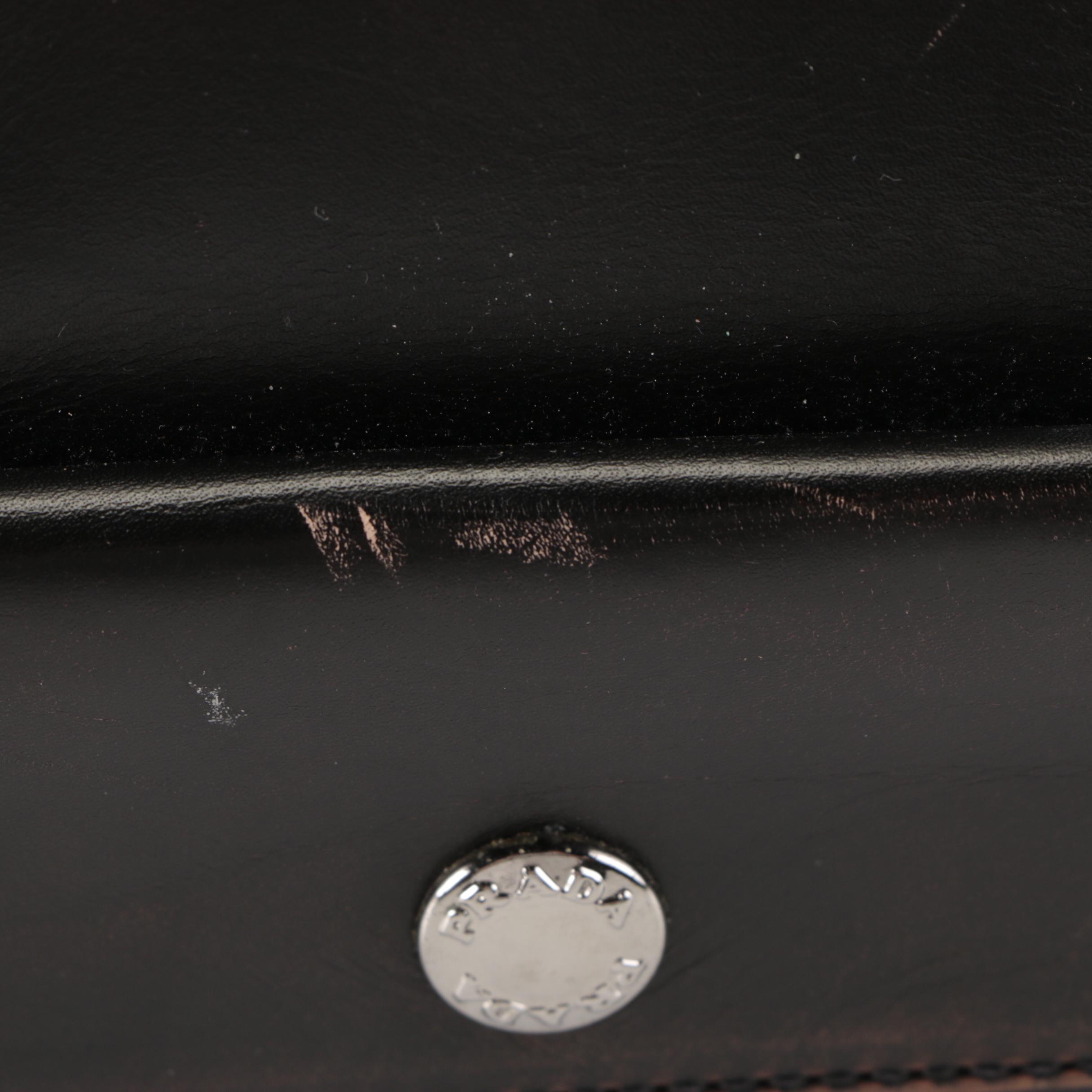 Prada Twin Pocket Tote in Grommet Embellished Leather