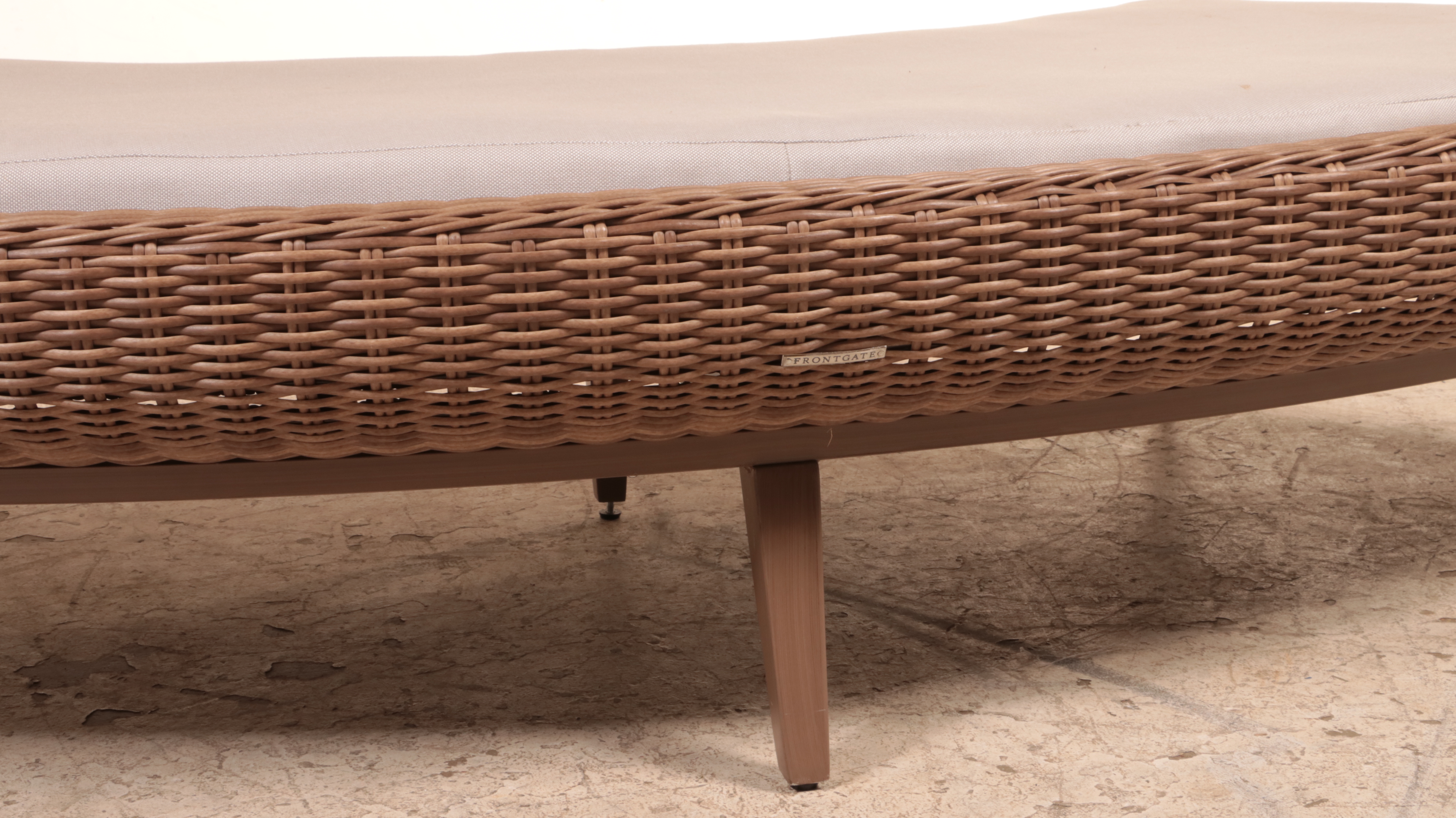 Frontgate "Sotto" Resin Wicker and Powder-Coated Aluminum Curved Ottoman