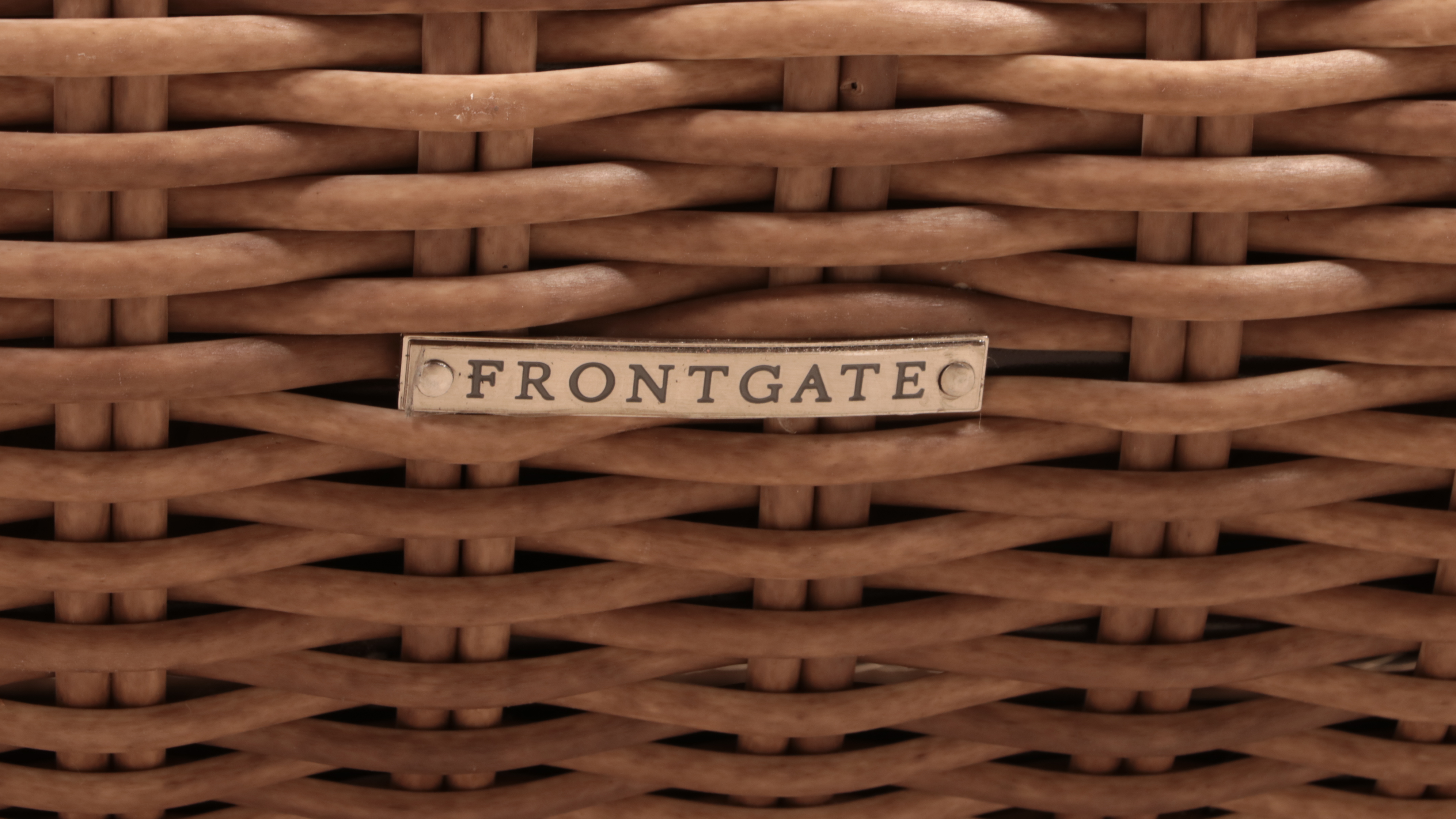 Frontgate "Sotto" Resin Wicker and Powder-Coated Aluminum Curved Ottoman