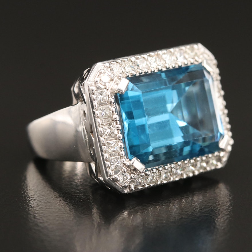 14K 22.86 CT London Blue and 1.43 CTW Diamond Halo Ring