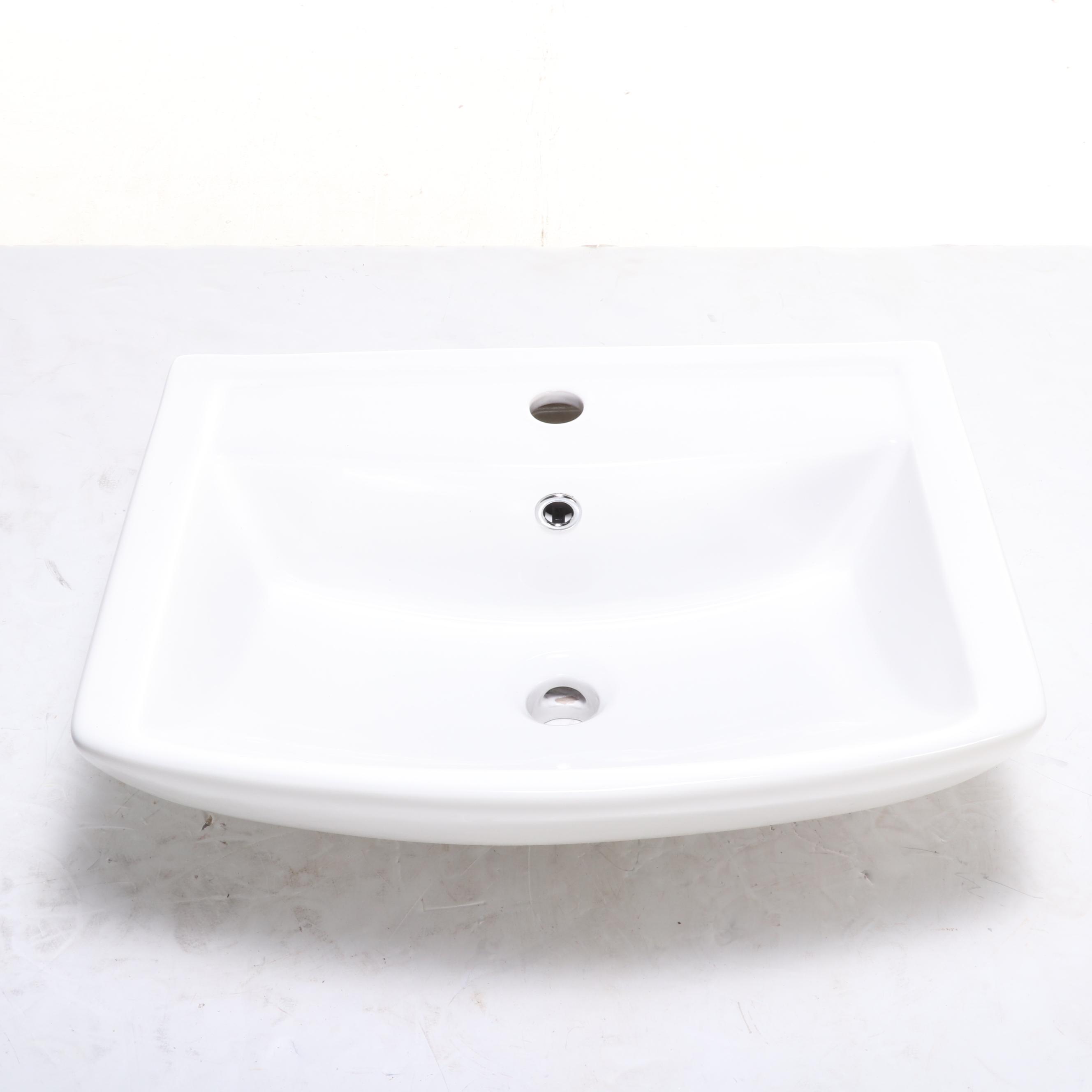 Porcelain Wall-Mount Bathroom Sink with Four Pop-Up Bathroom Drains